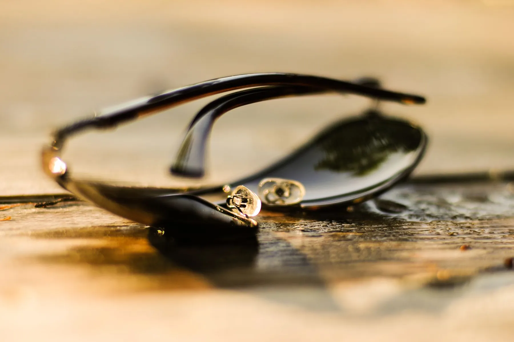 Sunglasses on a table, illustrating everyday measures that help.