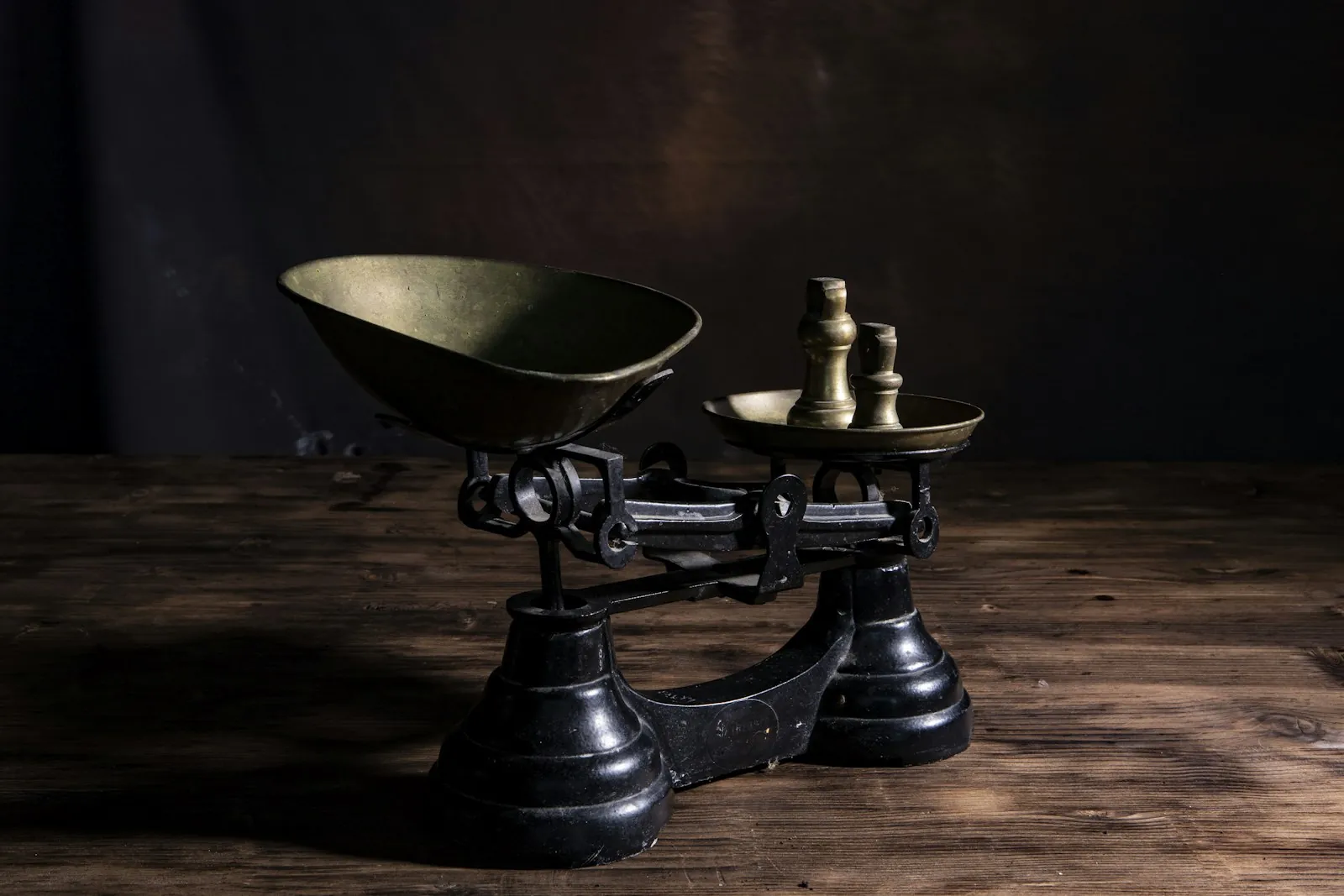 Scales weighing two sides, illustrating comparing options fairly.
