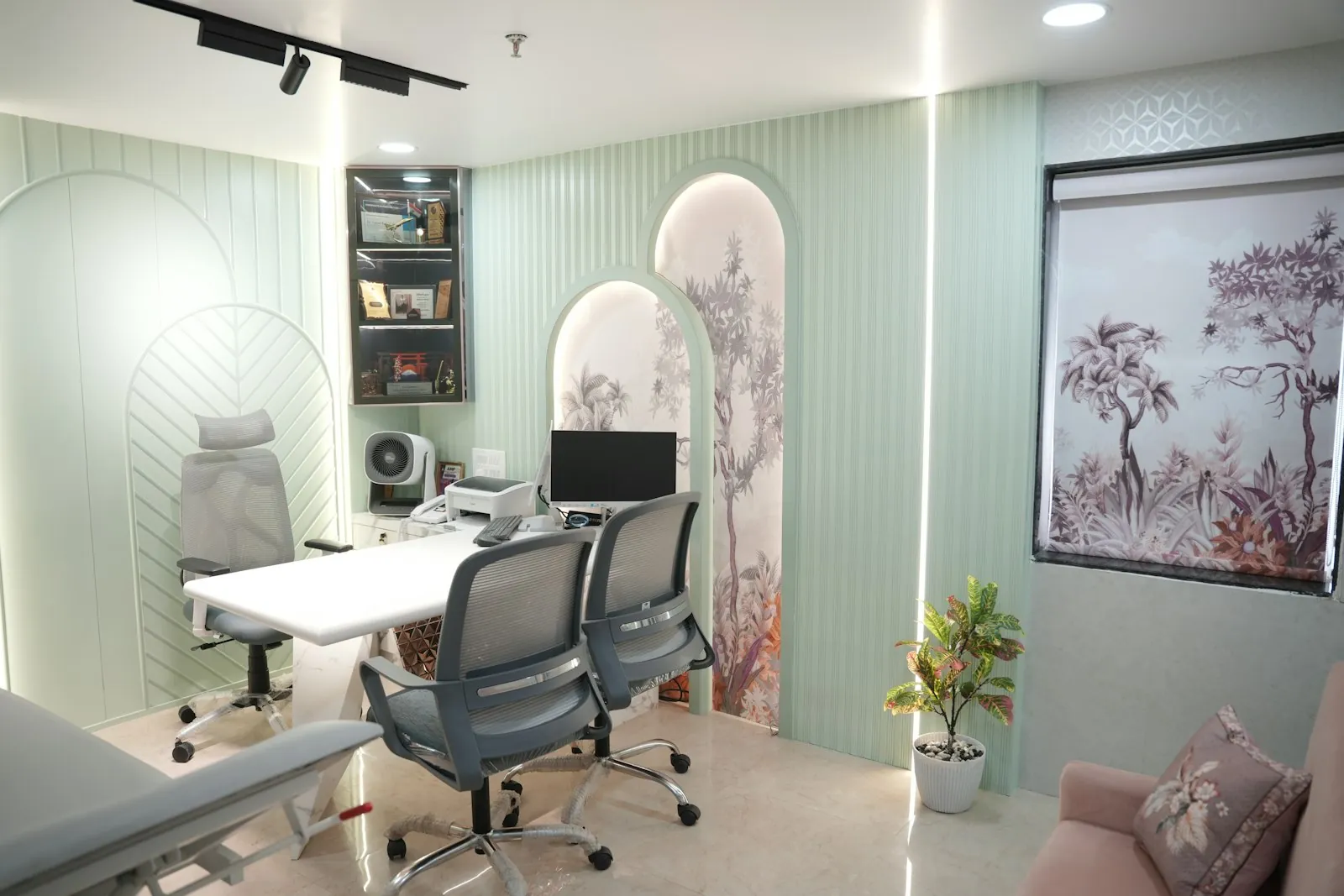 An energy-based device in a treatment room, illustrating skin tightening treatments.