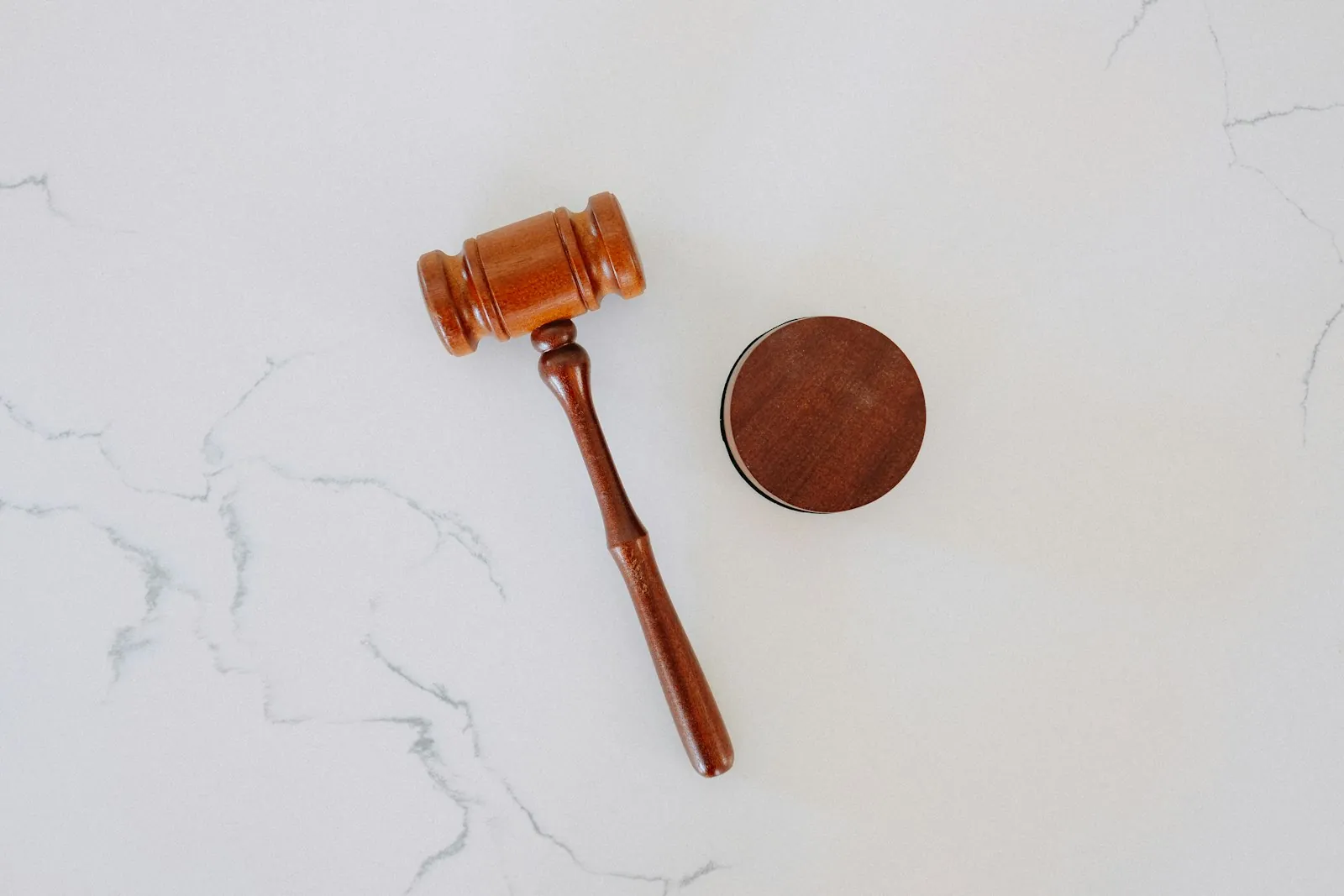 A legal reference on a desk, illustrating that published age thresholds are national regulations.