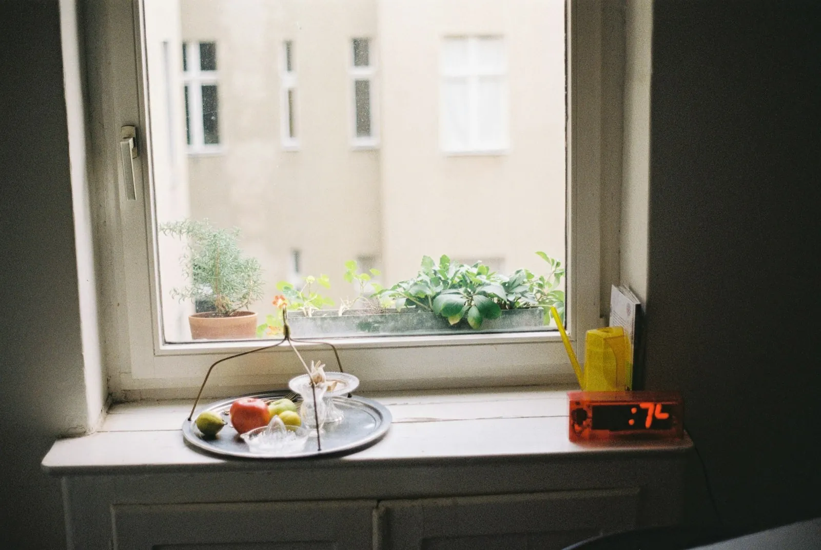 A timer on a windowsill, illustrating why a result is judged only after settling.