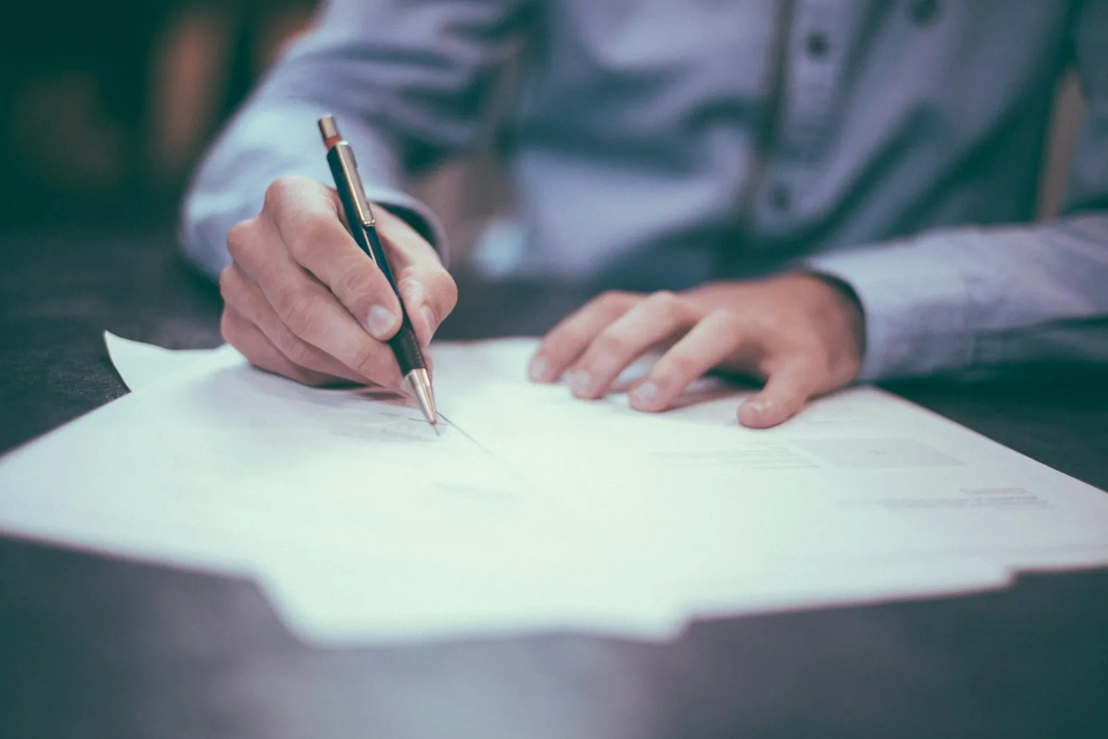 A signed document, illustrating asking for the revision policy in writing.