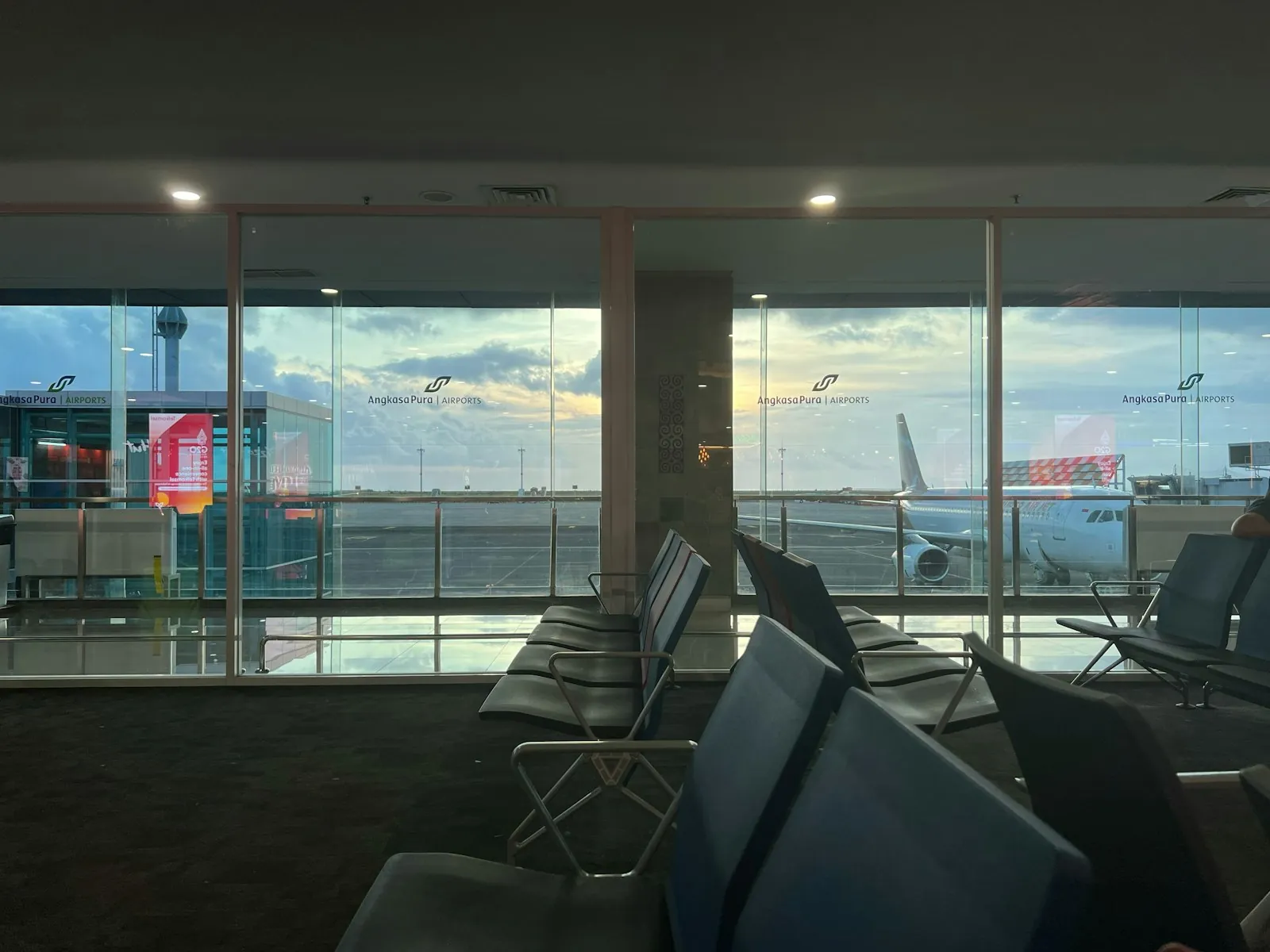 An empty airport gate, illustrating the distance between patient and surgeon after surgery.
