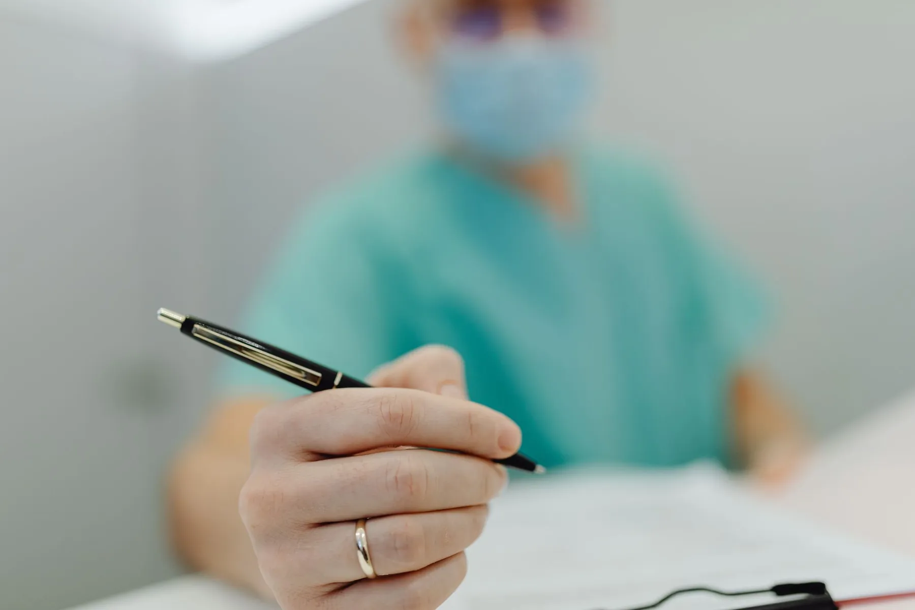 A surgical marker on a sterile field, illustrating incisions planned before an operation.
