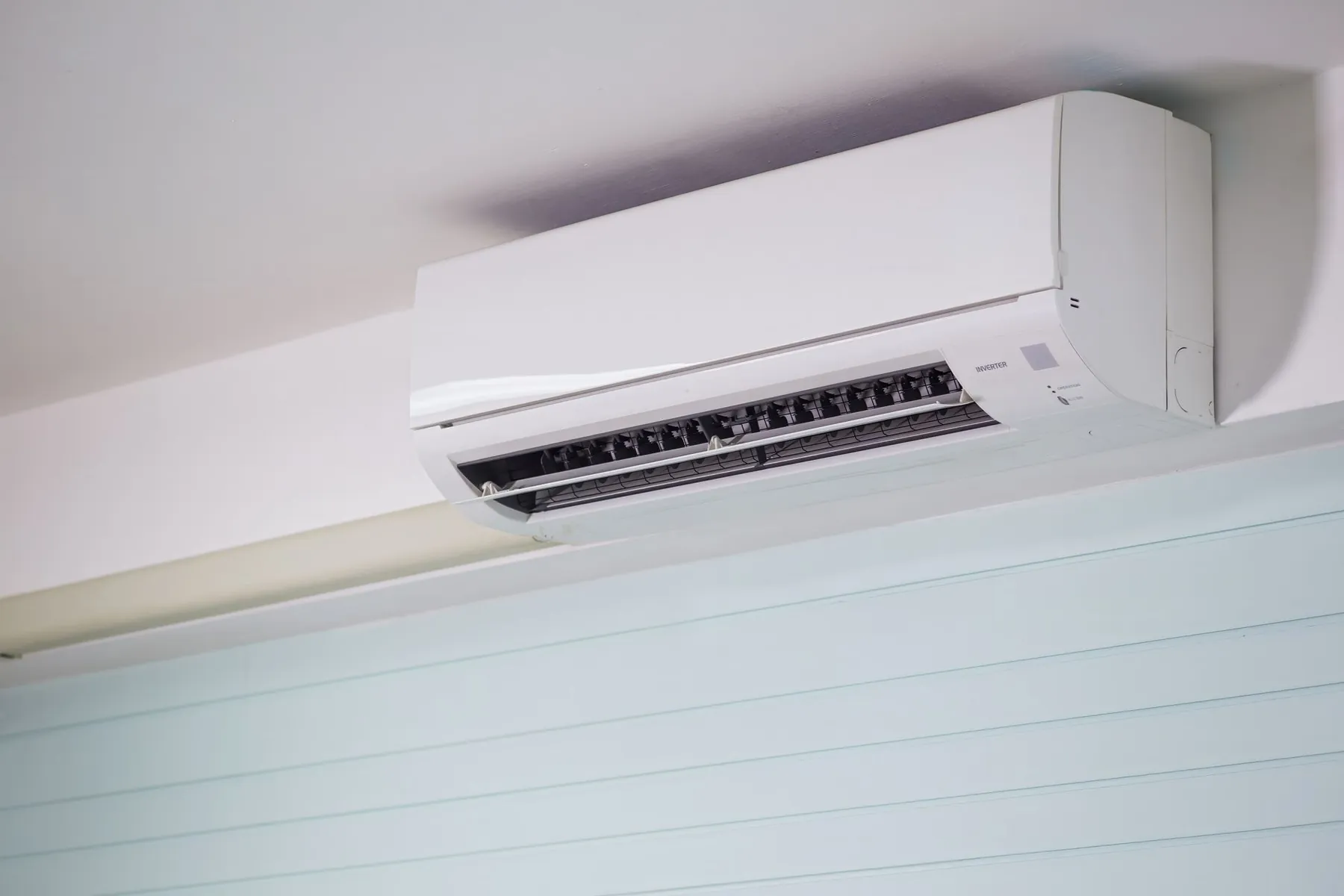 An air conditioning unit, illustrating staying cool while wearing a garment.