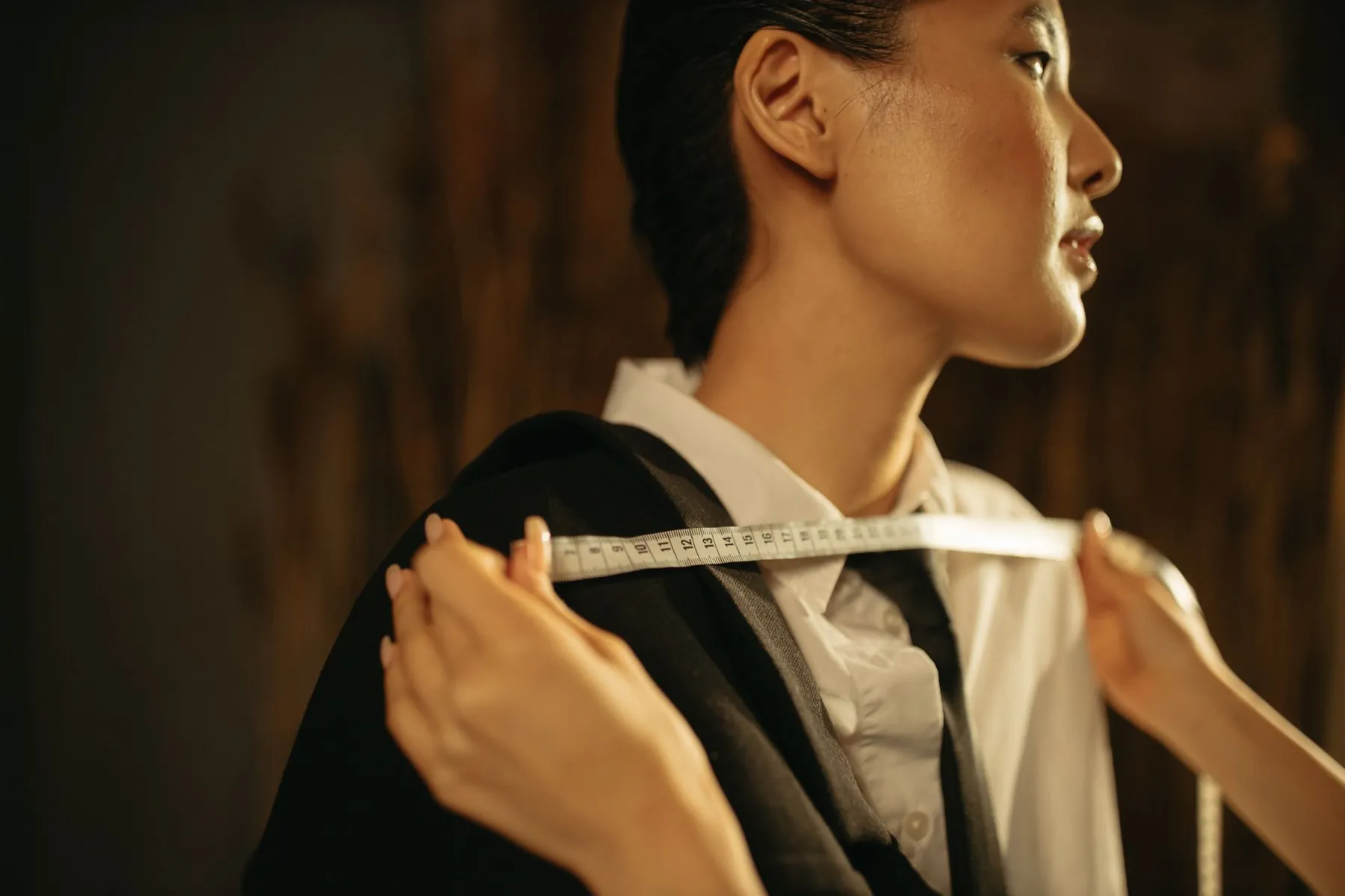 A measuring tape in use, illustrating the measurements taken at assessment.