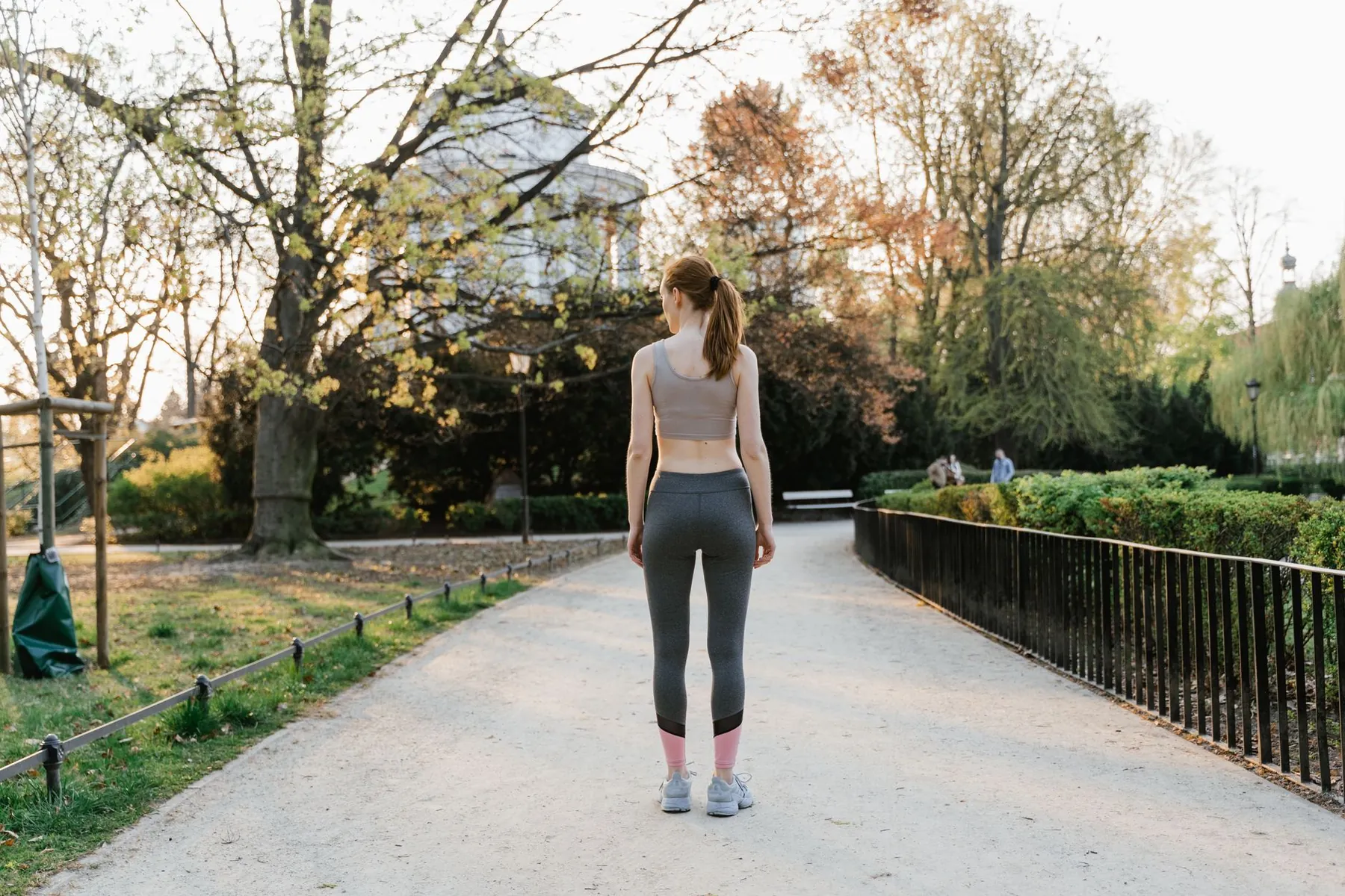 Someone walking outdoors, illustrating the gradual return to activity.