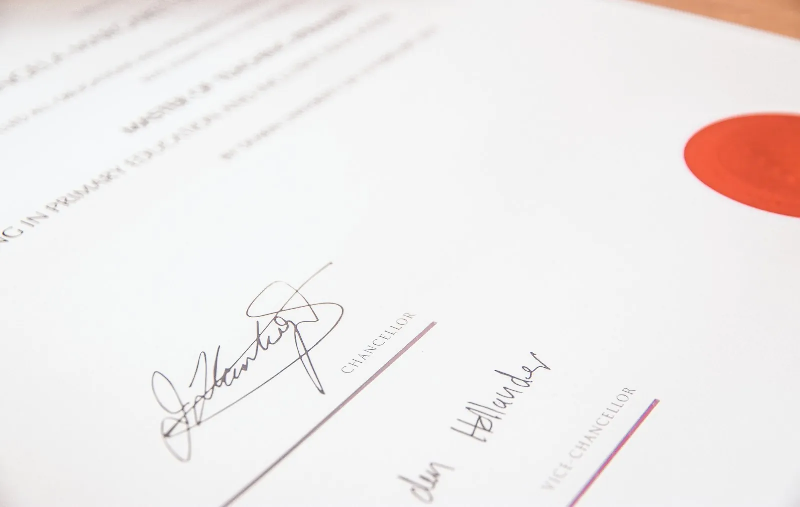 A certificate on a desk, illustrating verifying a surgeon's qualification independently.