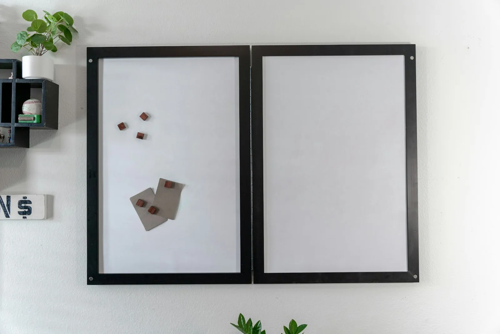 A framed certificate on a wall, illustrating verifying a surgeon's qualification.