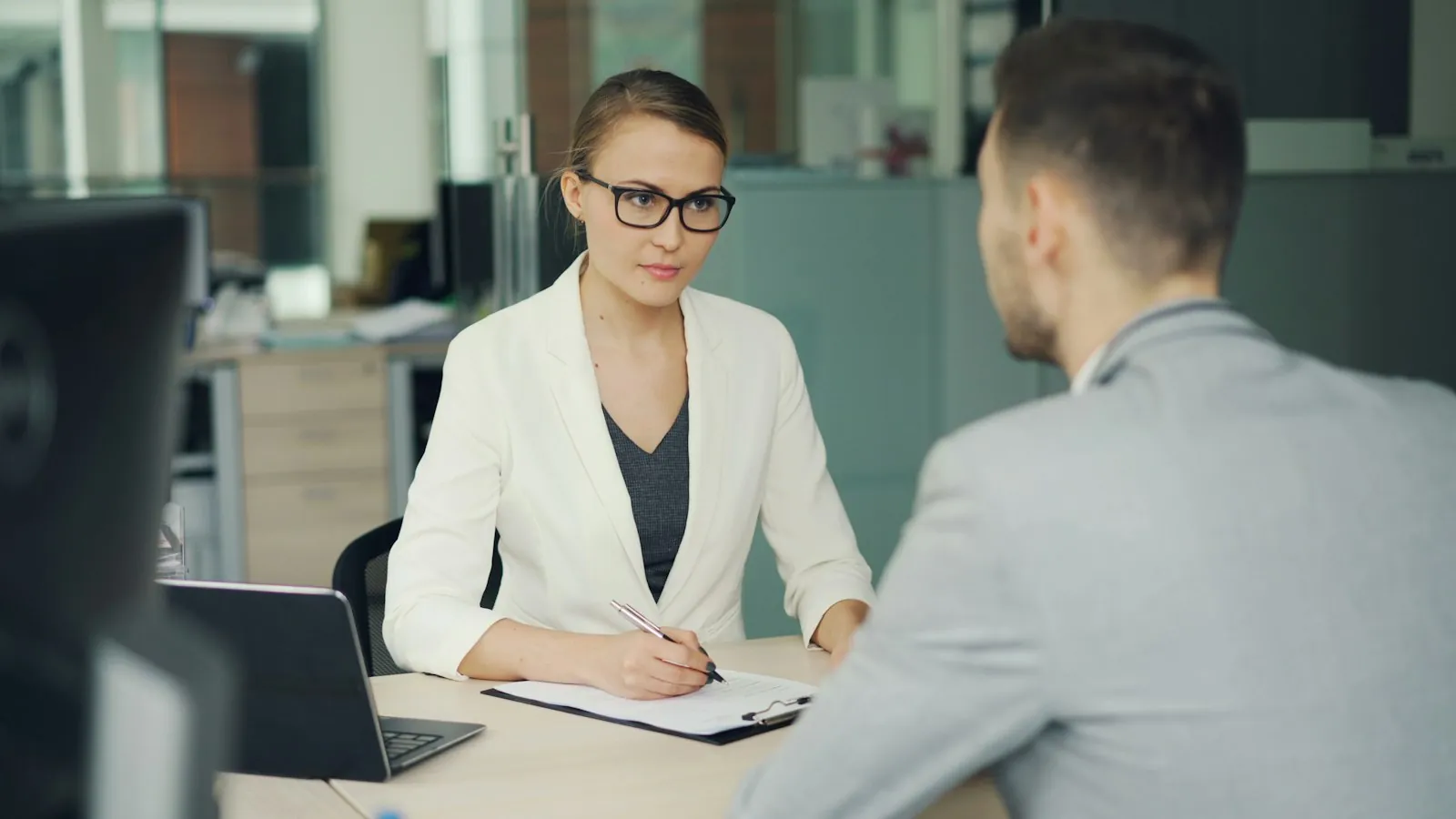 A conversation across a desk, illustrating what to listen for in a consultation.