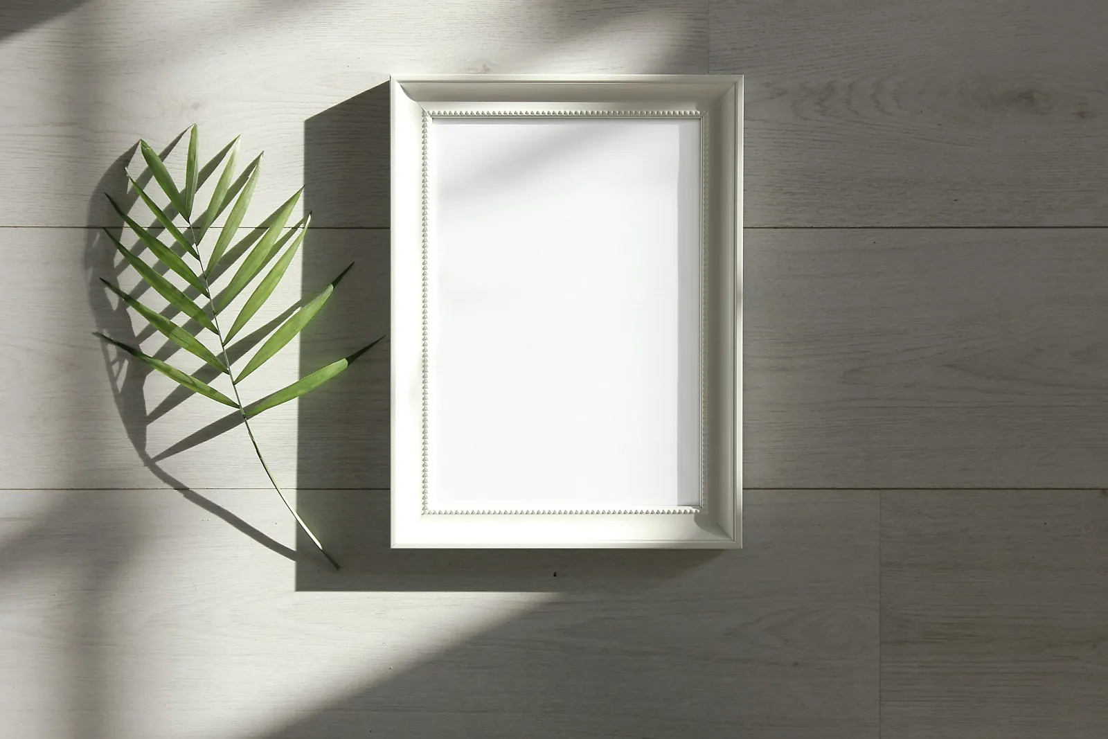 Empty frames on a wall, illustrating the absence of a results gallery.