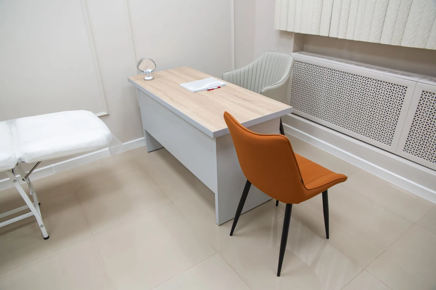 An empty consulting room, illustrating arranging who will see you at home.