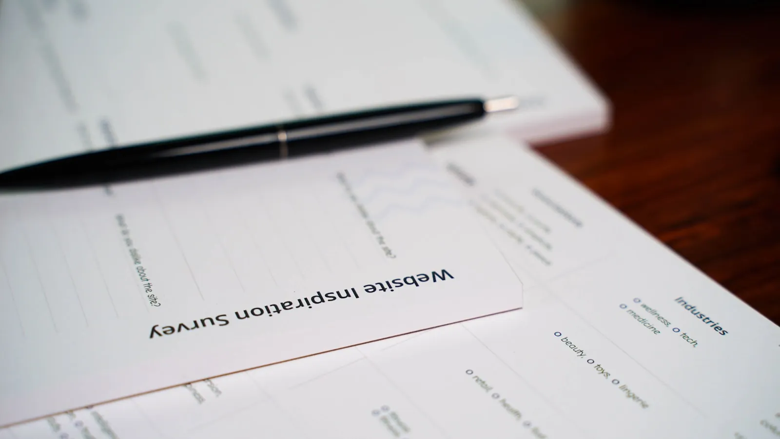 A document being signed, illustrating consent and being told the risks before surgery.