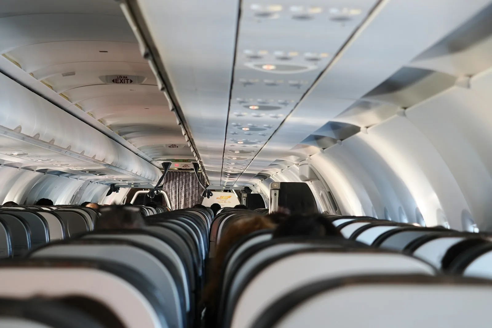 An empty aircraft cabin, illustrating the hours of sitting a long flight involves.