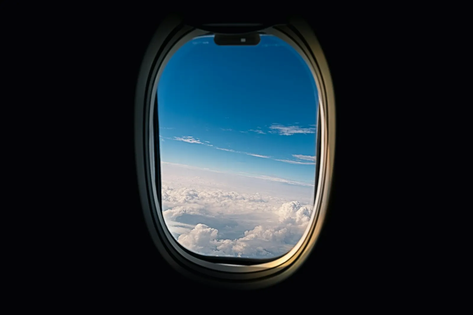 A view from an aircraft window, illustrating the journey home.