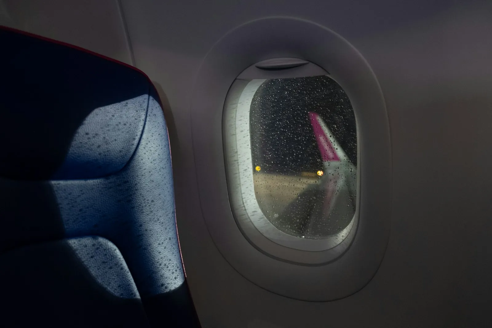 An empty aircraft cabin, illustrating the hours of sitting a long flight involves.