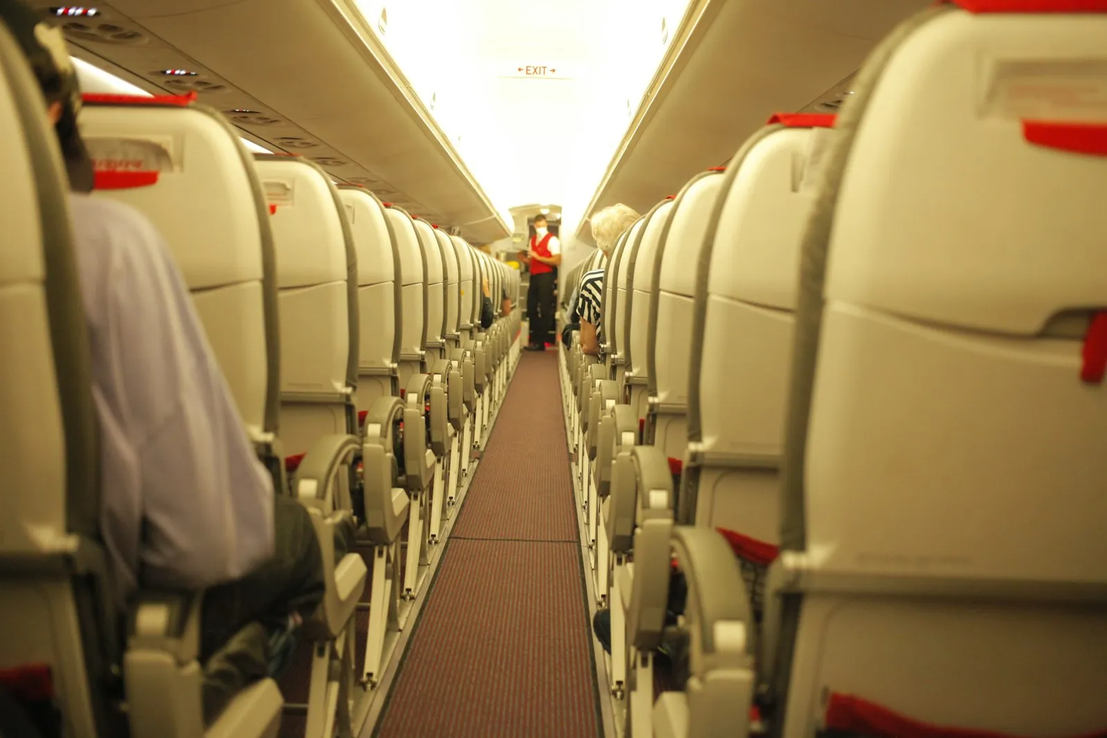 An empty aircraft cabin, illustrating the dry environment of a long flight.