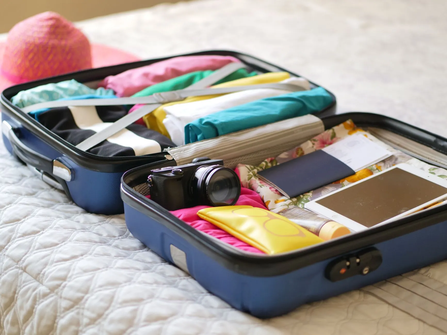 Sunglasses packed in hand luggage, illustrating what to carry on board.