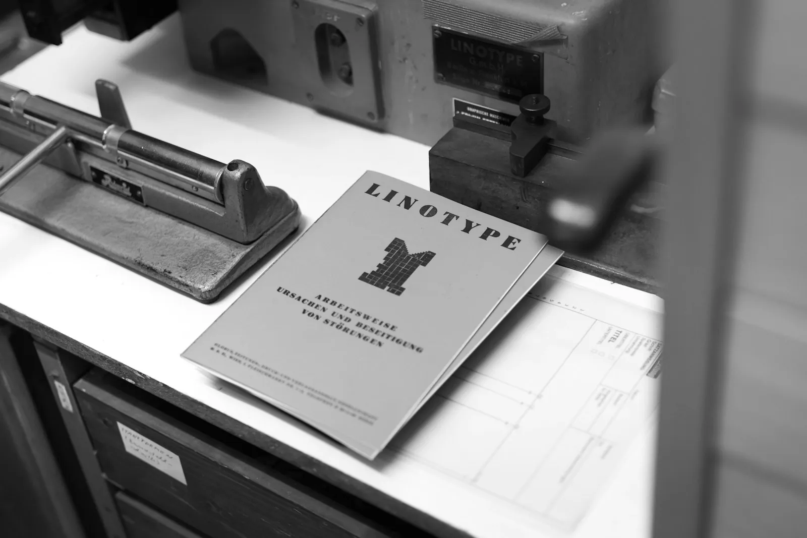 Printed instructions on a desk, illustrating asking for aftercare guidance in writing.