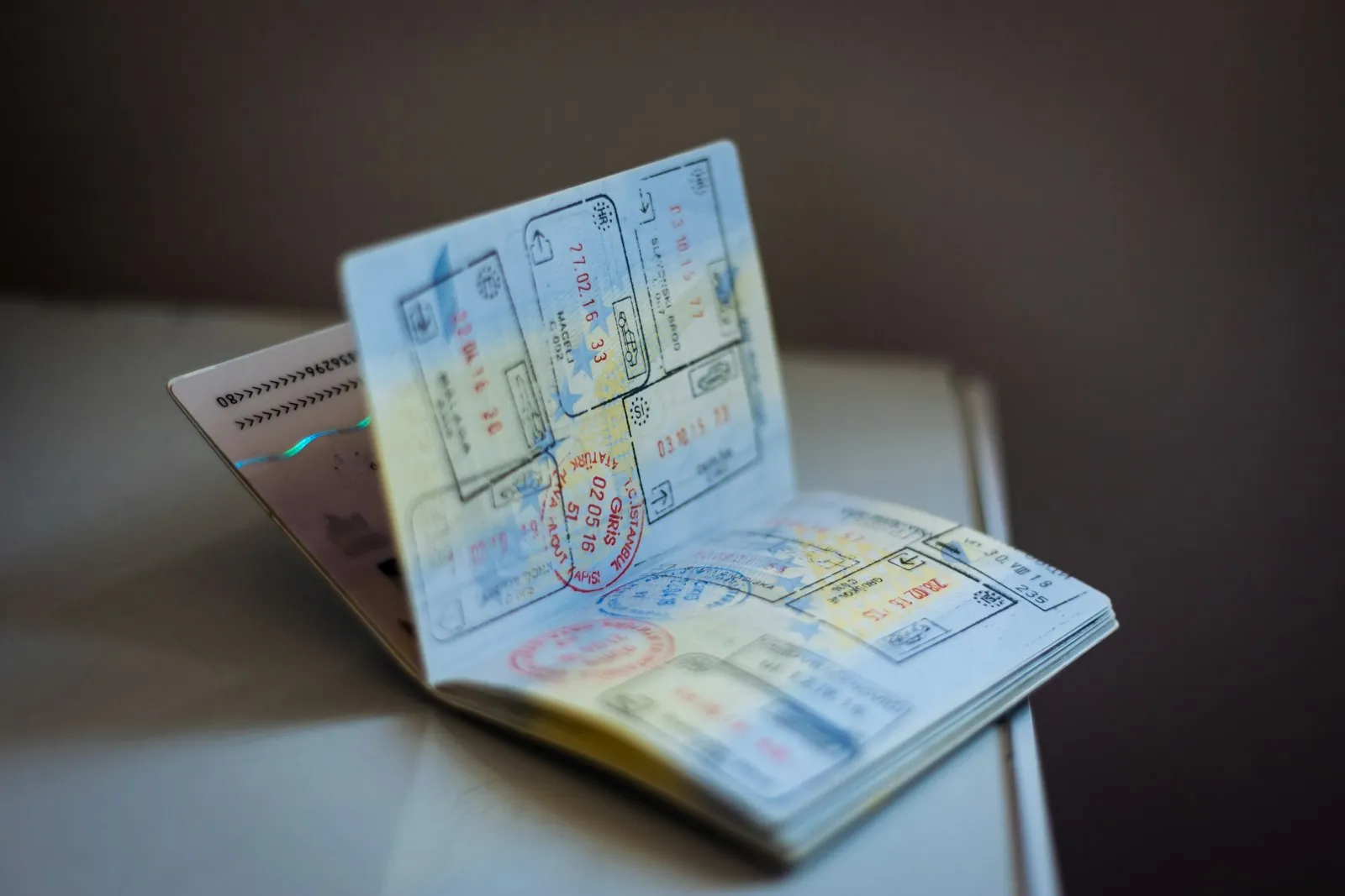 A desk set for travel planning, illustrating arranging surgery from another country.