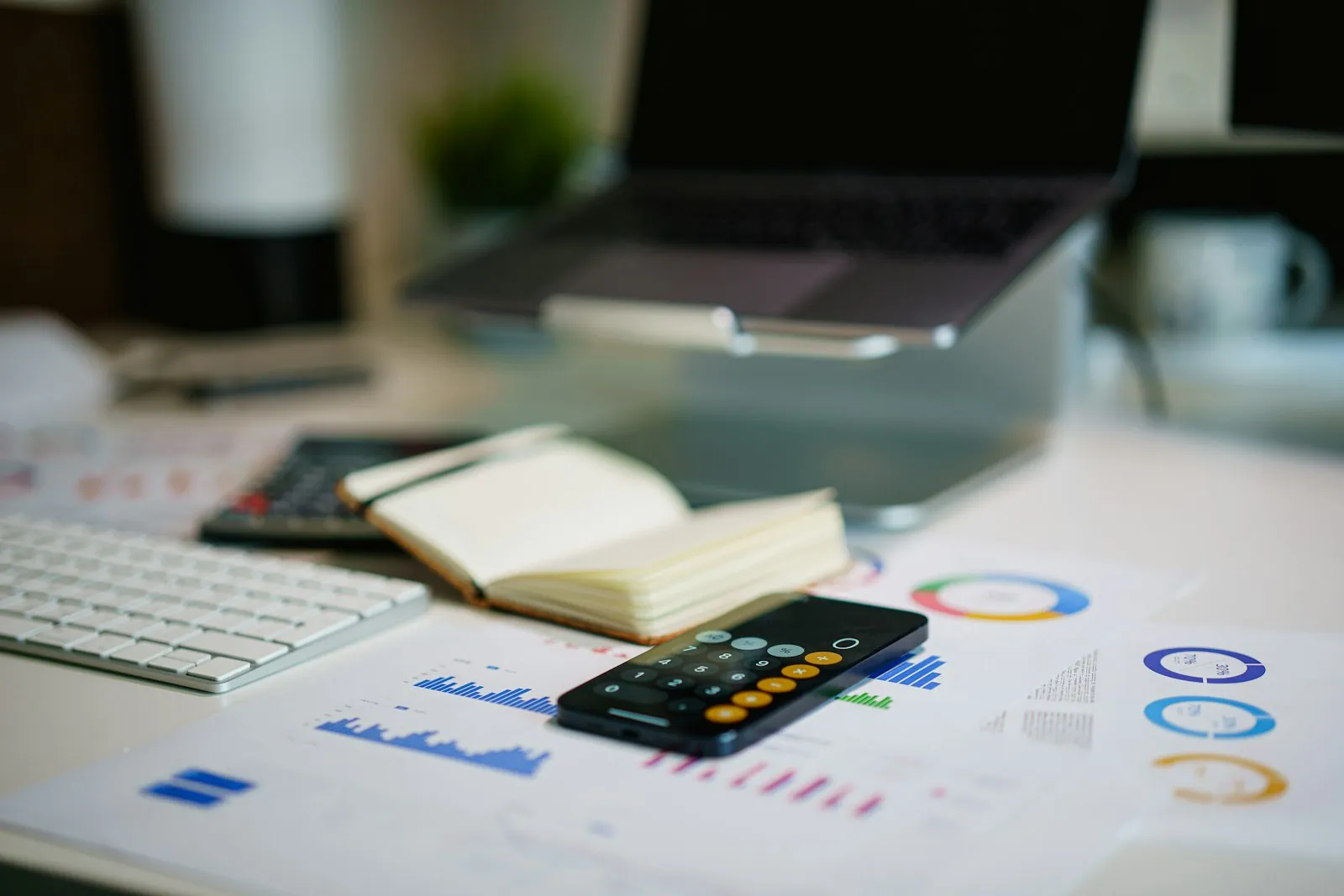Paperwork and a calculator, illustrating checking what a quotation includes.