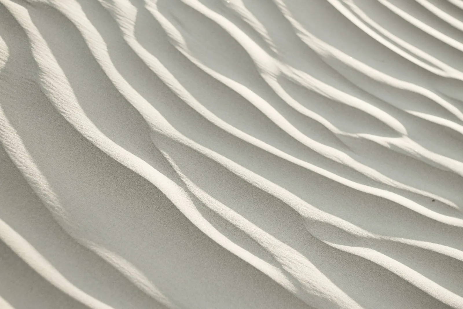 Ridges in a surface, illustrating the irregularity people describe after liposuction.