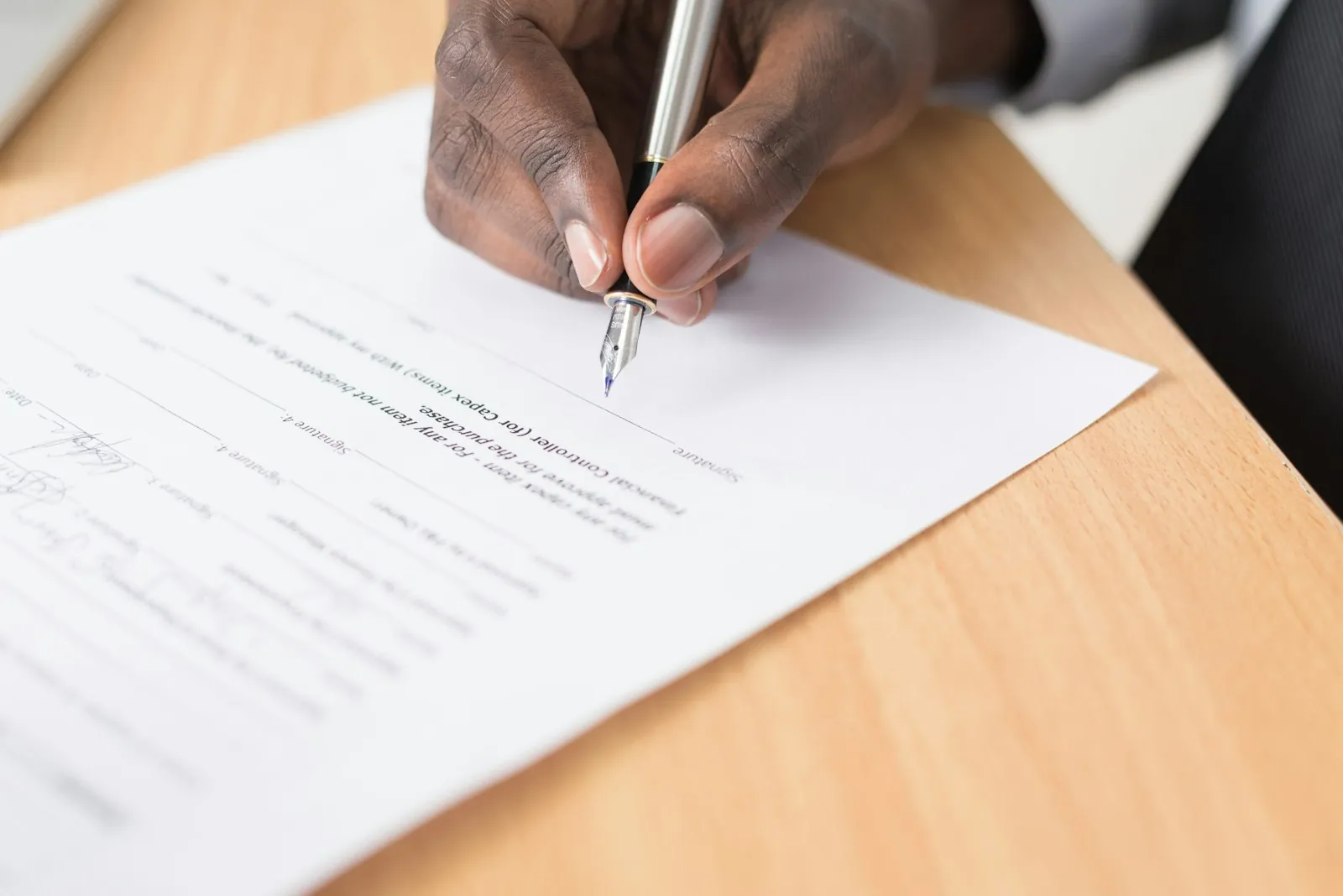 A signed policy document, illustrating asking for the revision terms in writing.