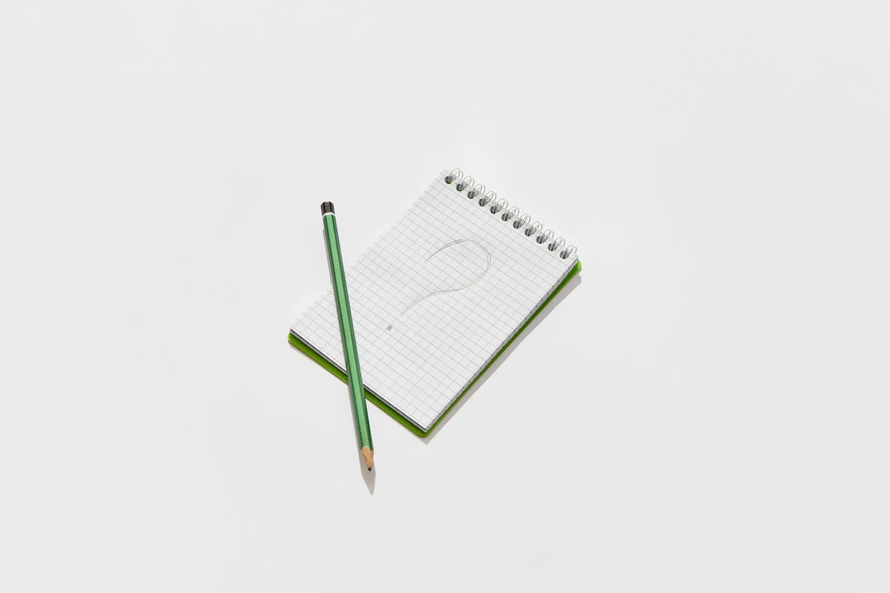 Questions written in a notebook, illustrating preparing for the appointment.