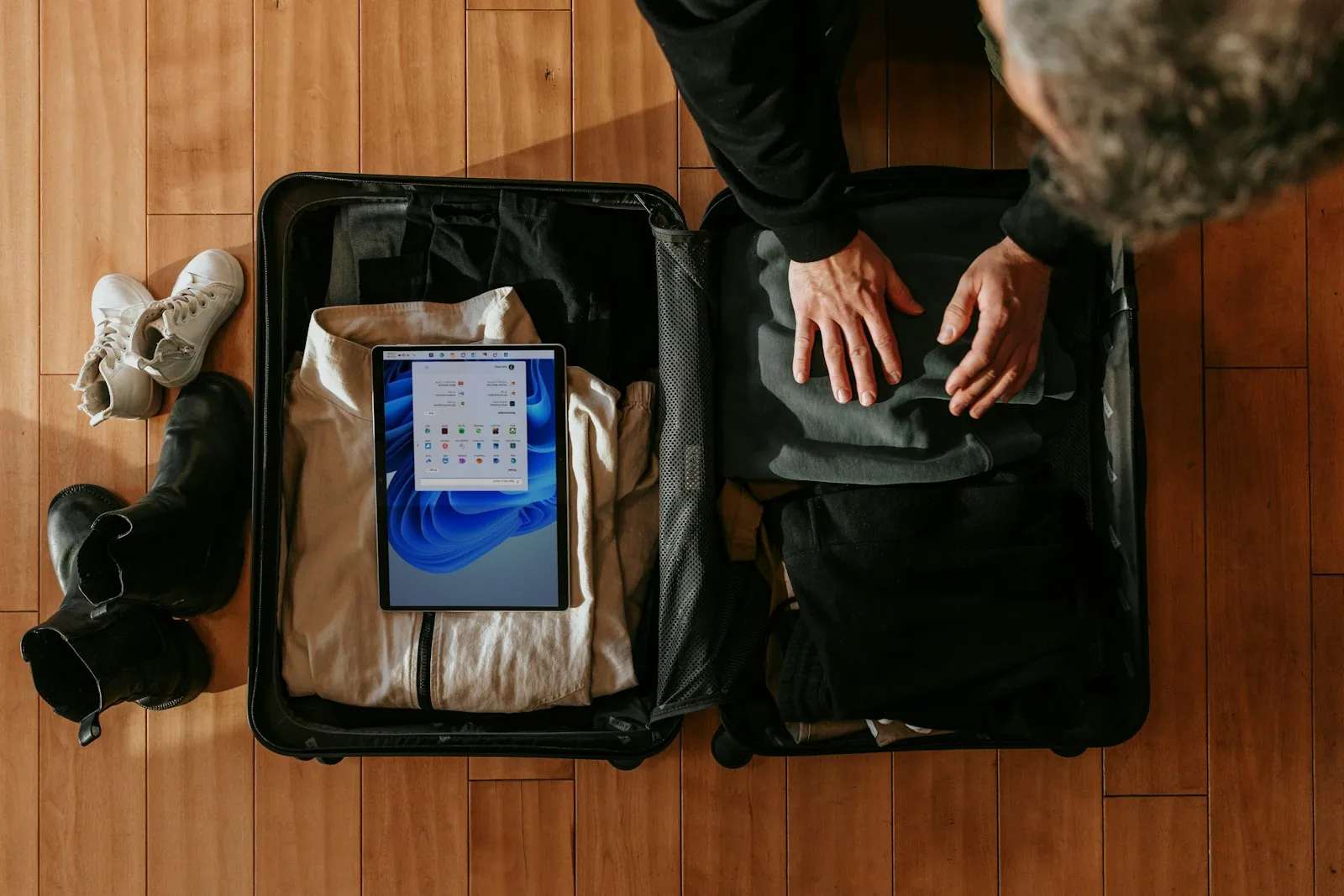 Travel documents being packed, illustrating planning surgery from another country.