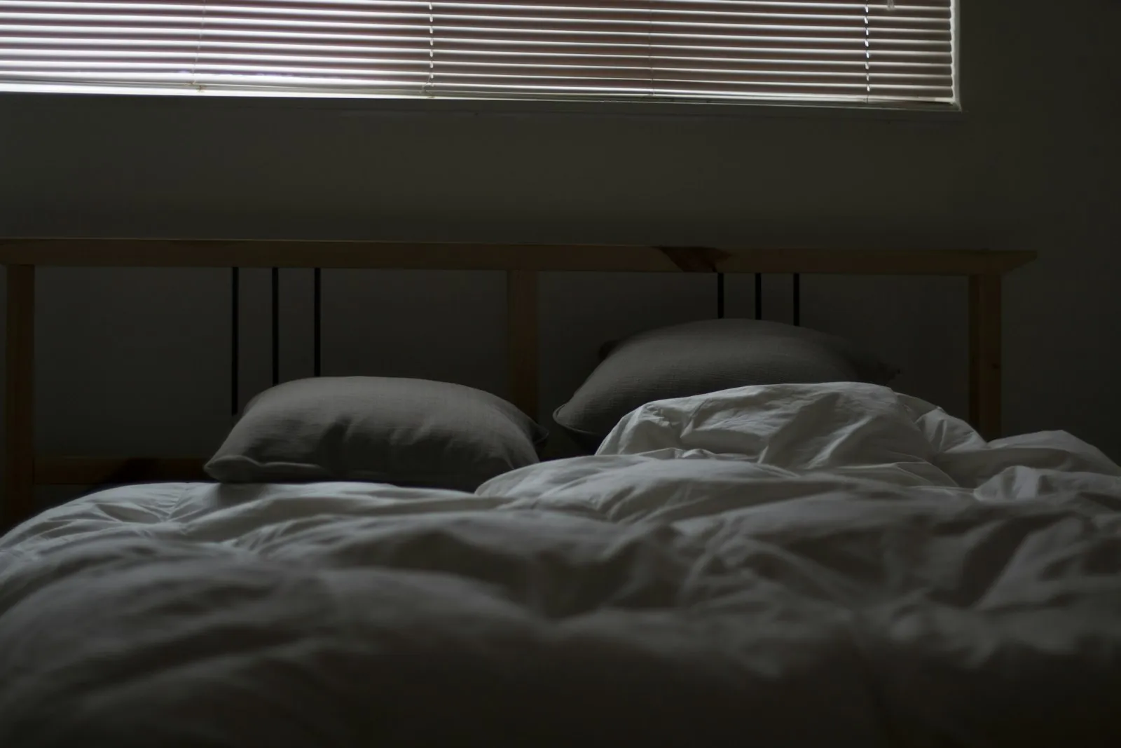 A quiet bedroom, illustrating recovery with the head elevated.
