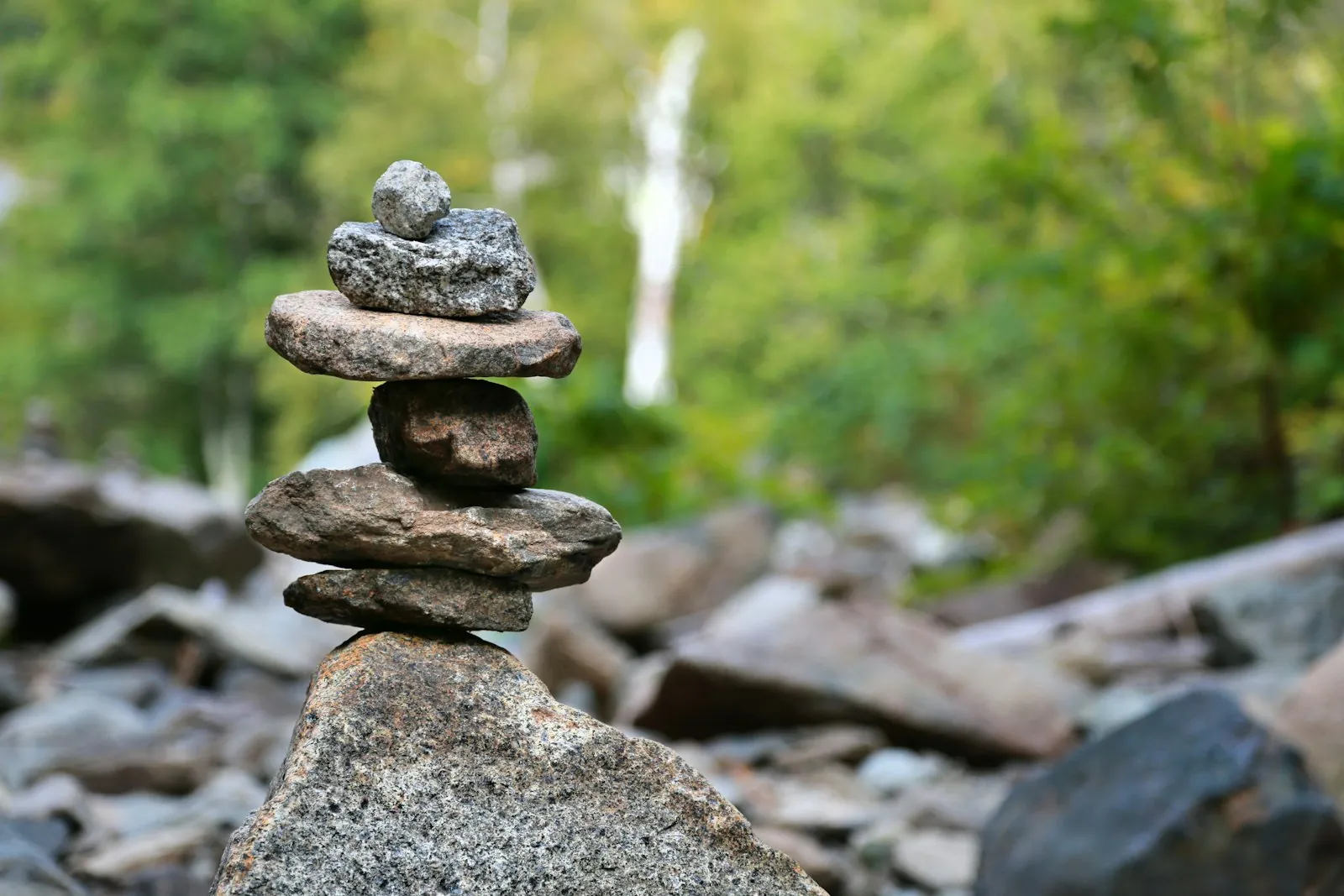 Stones balanced carefully, illustrating judging risk in proportion.