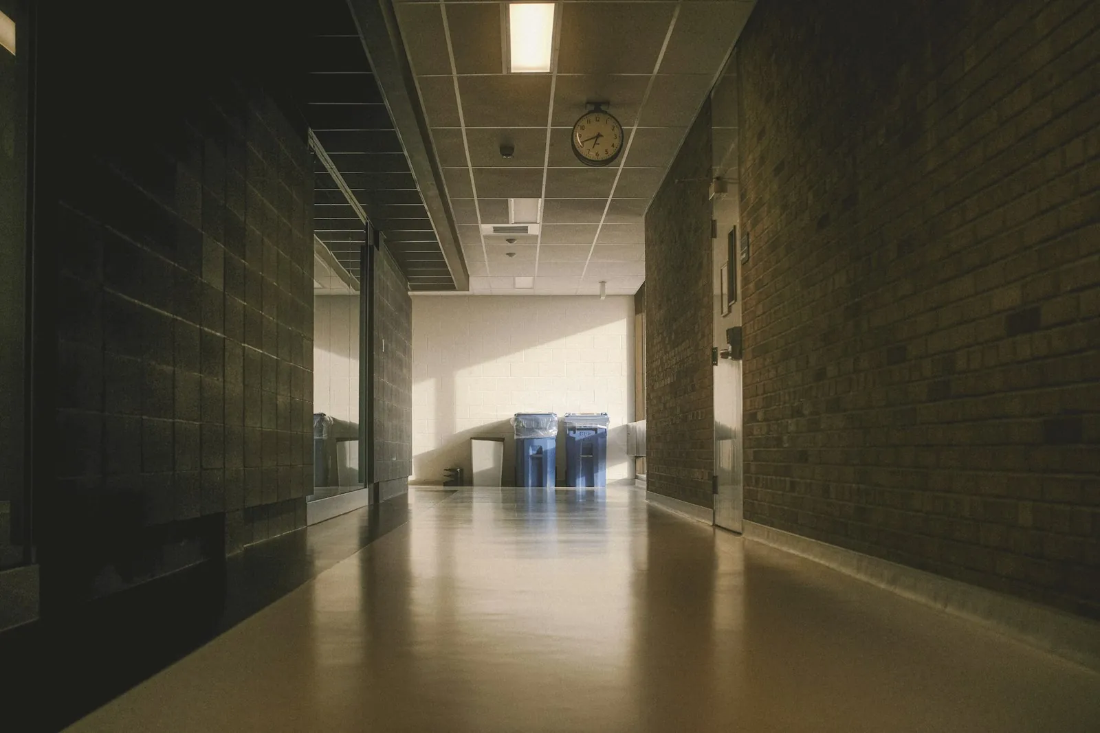 A quiet clinic corridor, illustrating a day procedure rather than a hospital stay.
