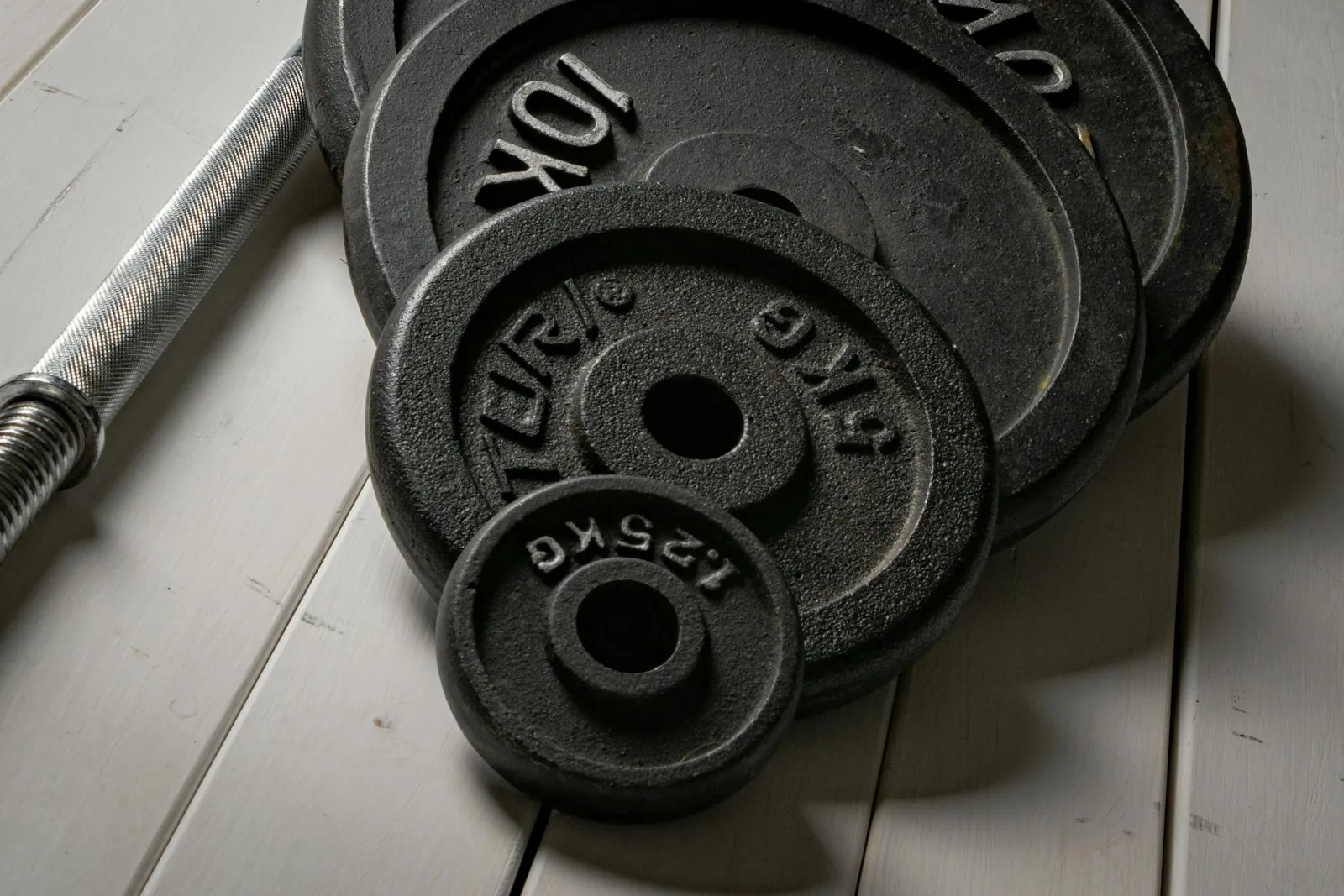 Graded weights in a row, illustrating risks set out in proportion.