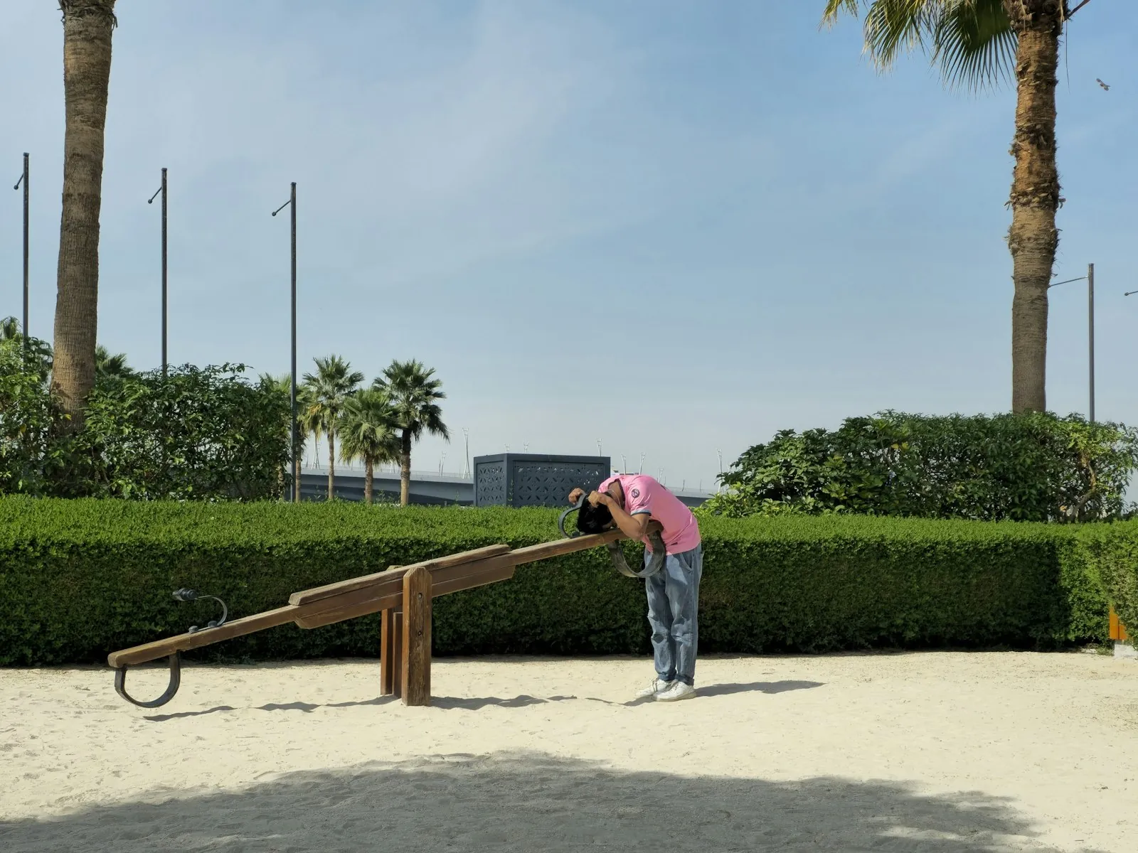 A seesaw at rest, illustrating two options weighed against each other.