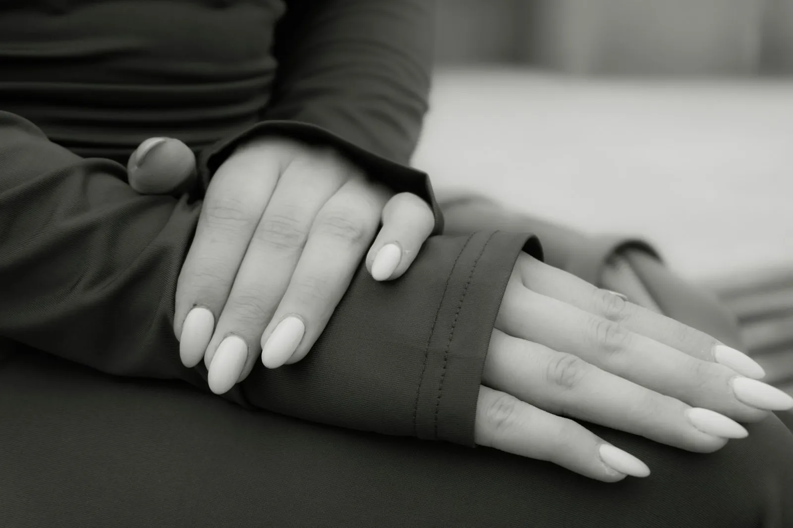 Hands kept still, illustrating breaking the habit of rubbing the eyes.