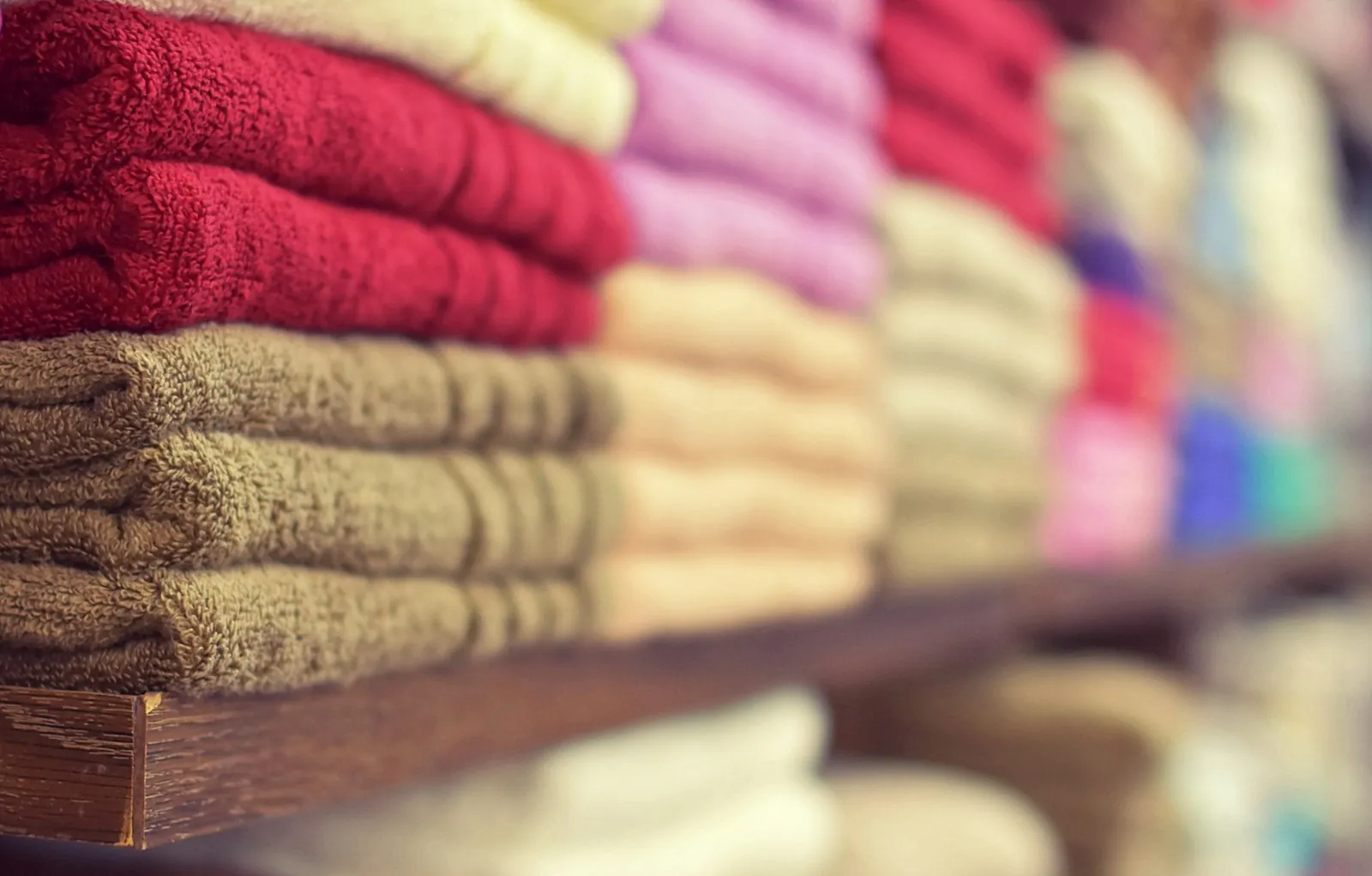 Soft cloths folded ready, illustrating preparing for cool compresses.