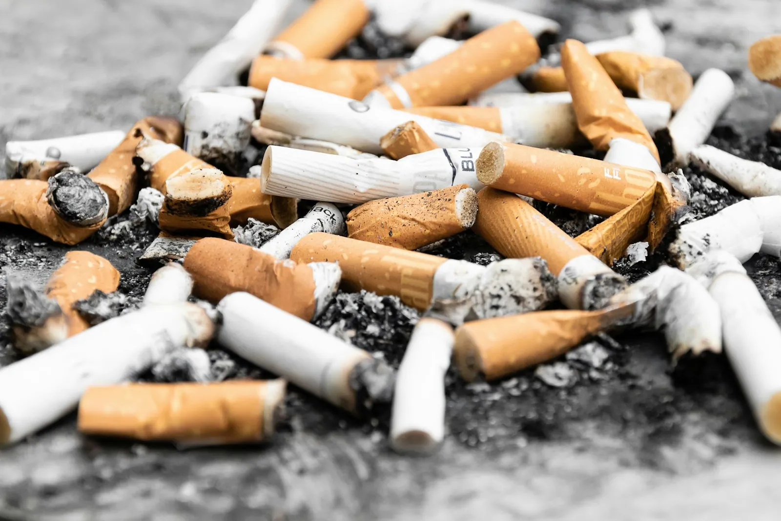 A broken cigarette, illustrating stopping smoking well before surgery.
