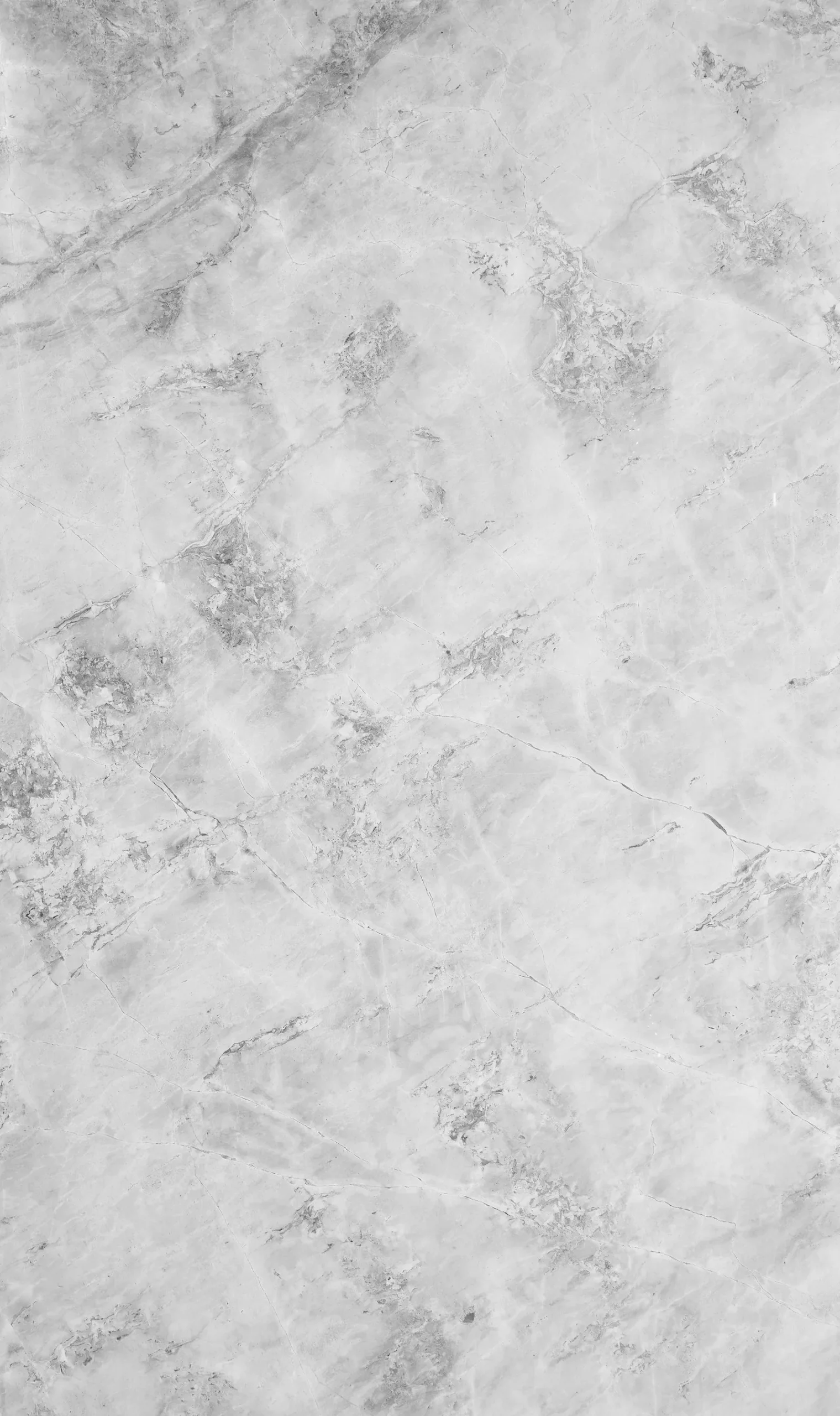 A smooth marble surface in soft shadow.