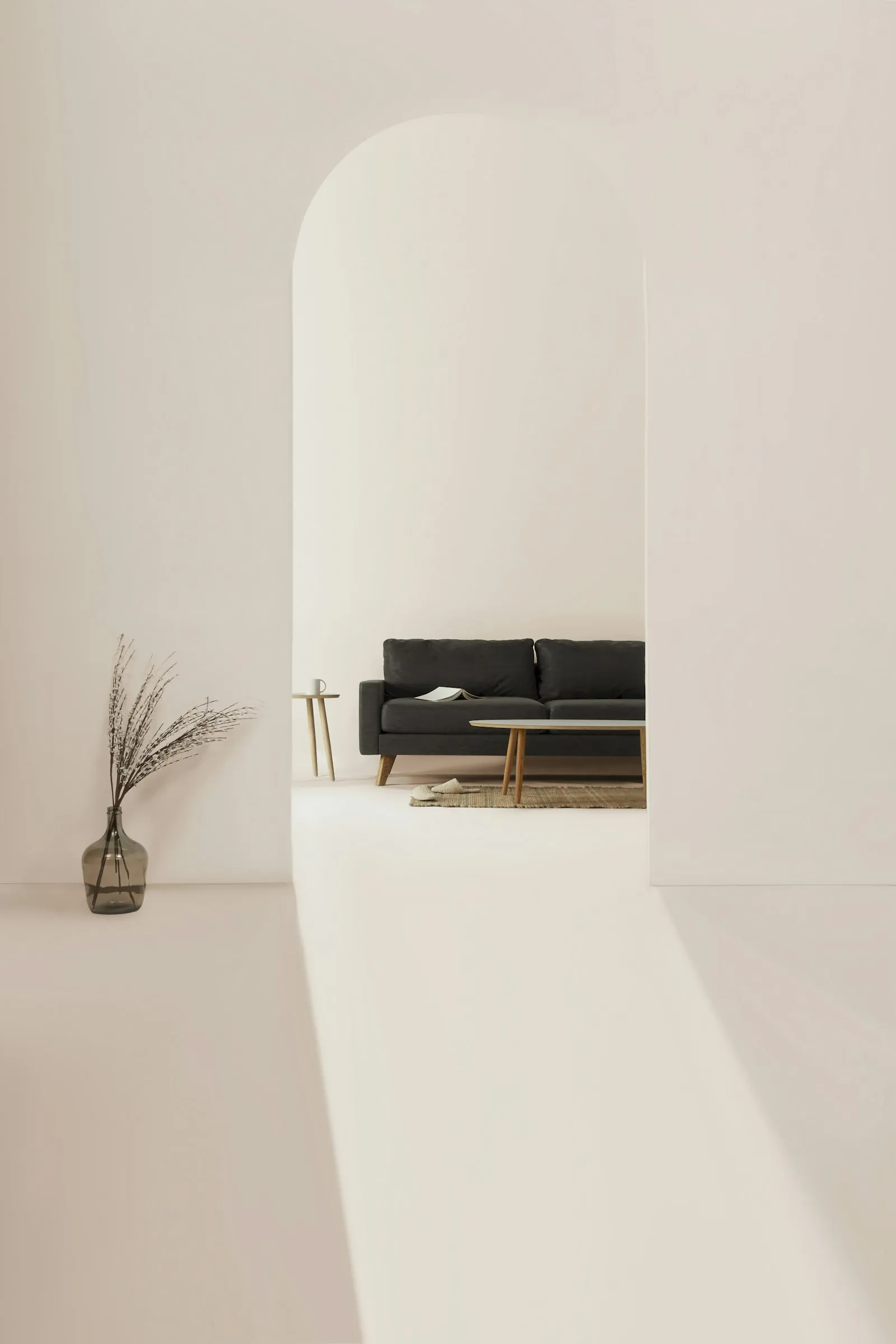 A white arched doorway in soft daylight.