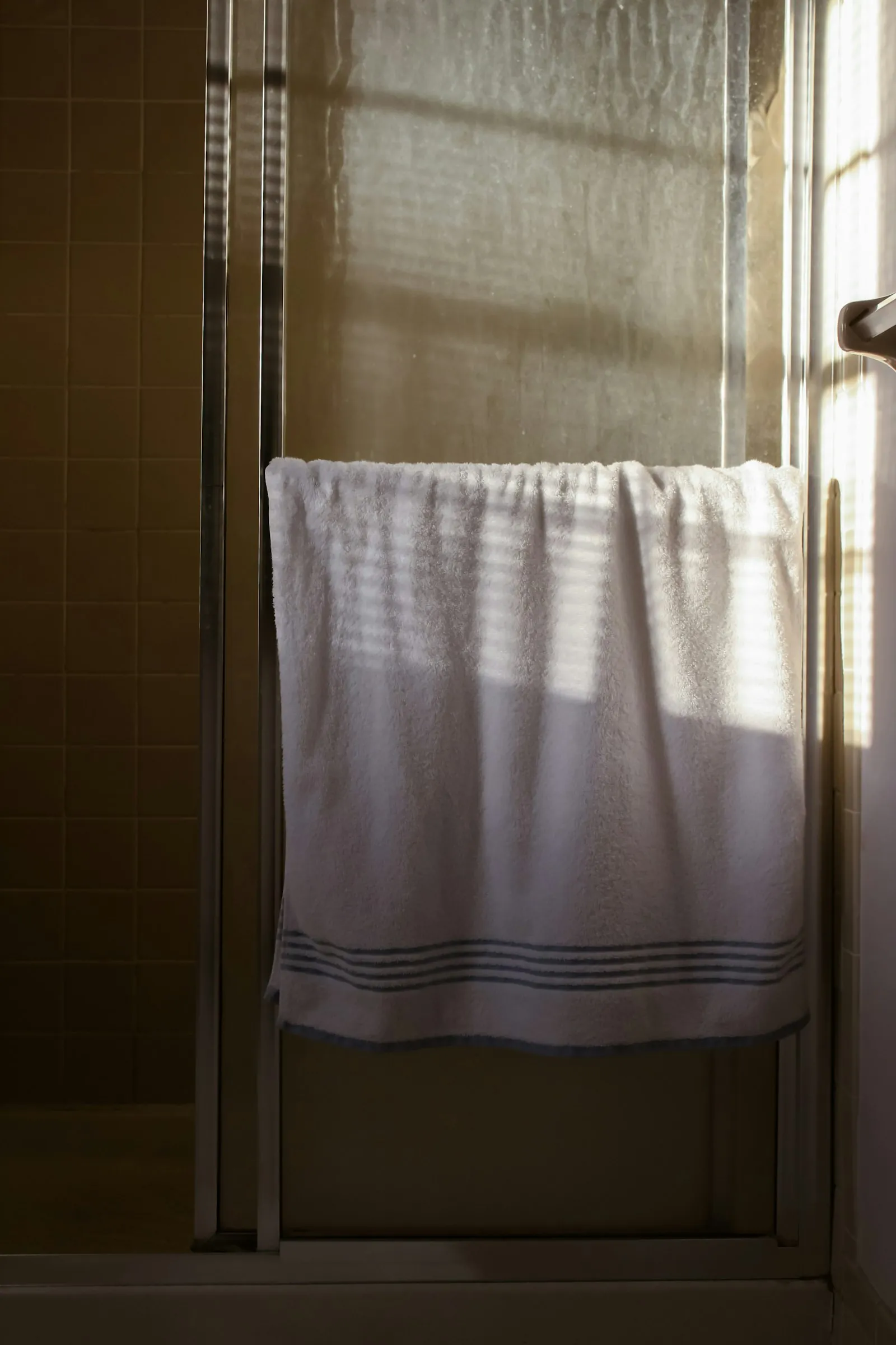 Folded towels in quiet daylight.
