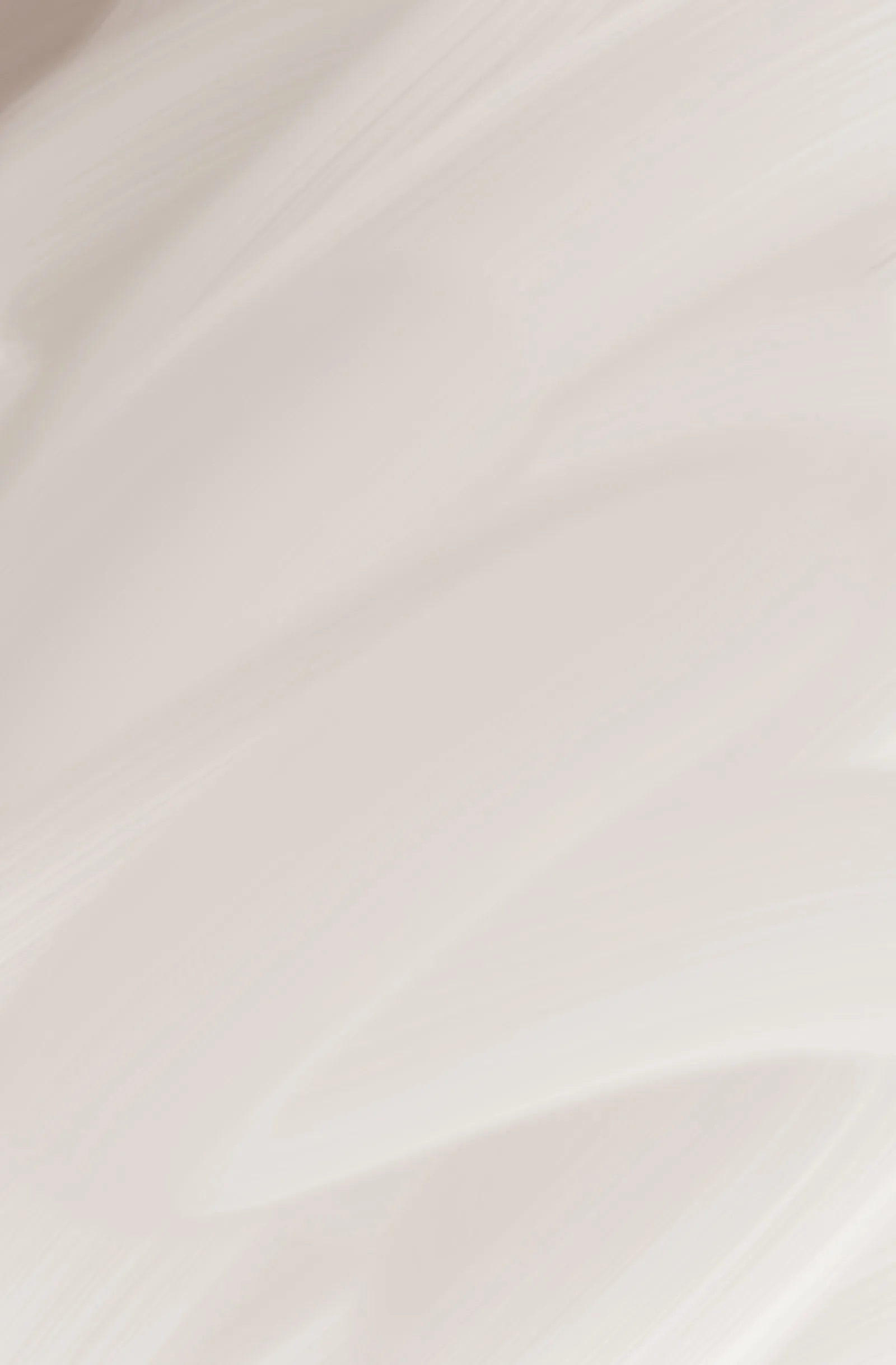 A smooth ceramic surface in soft light.
