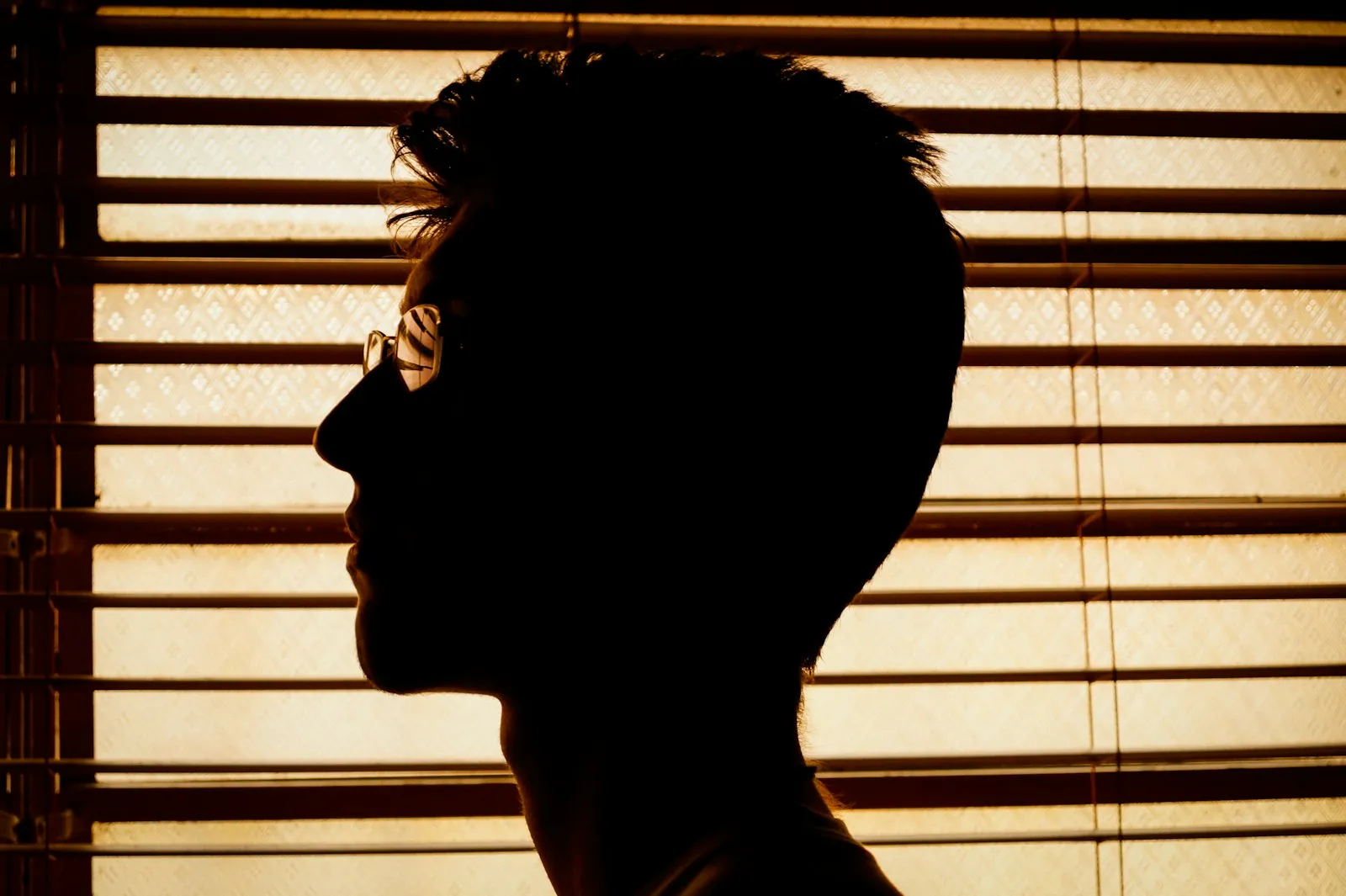 A profile against soft light, illustrating how the nose reads from the side.