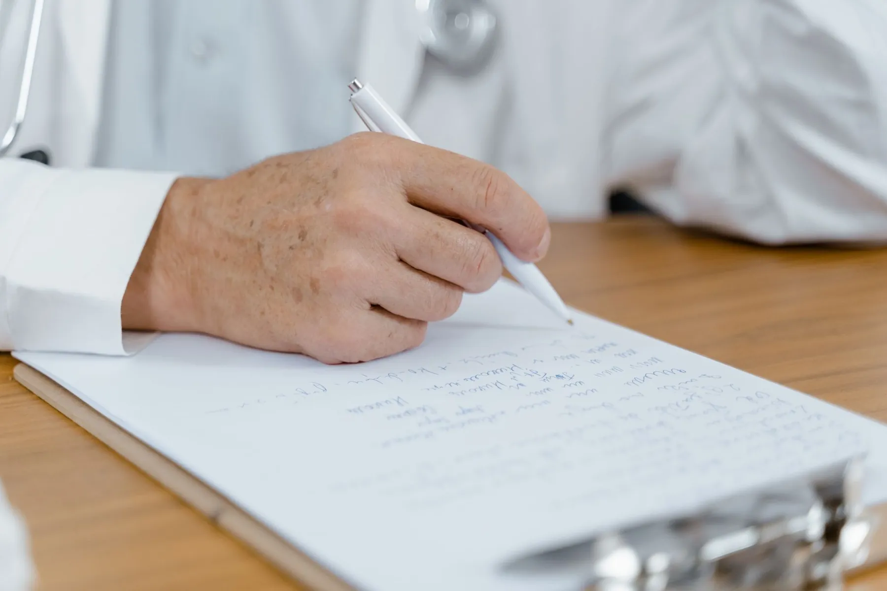 A quiet consulting desk, illustrating the rhinoplasty assessment.