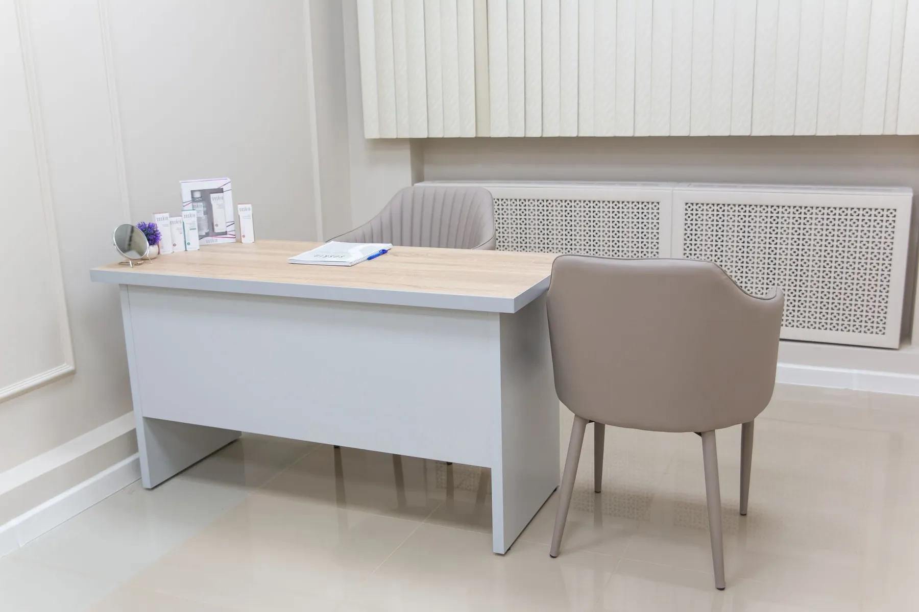 A quiet consulting room, illustrating where the plan is agreed.