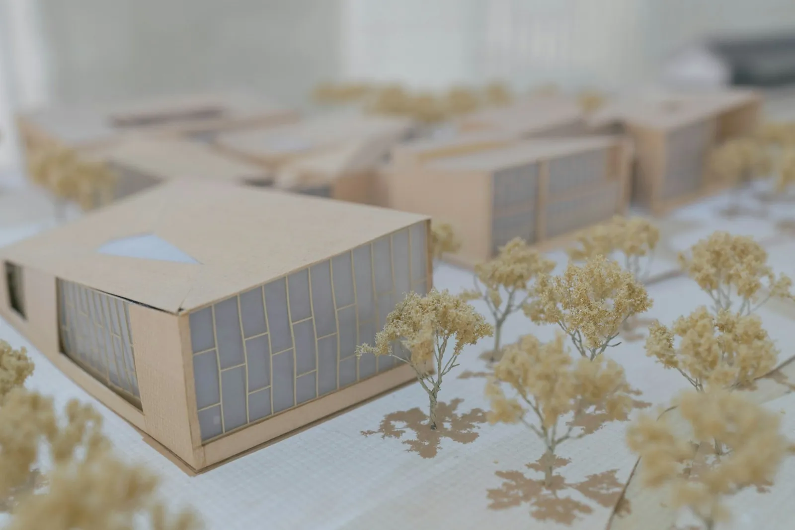 A scale model under construction, illustrating a structure being rebuilt to a plan.
