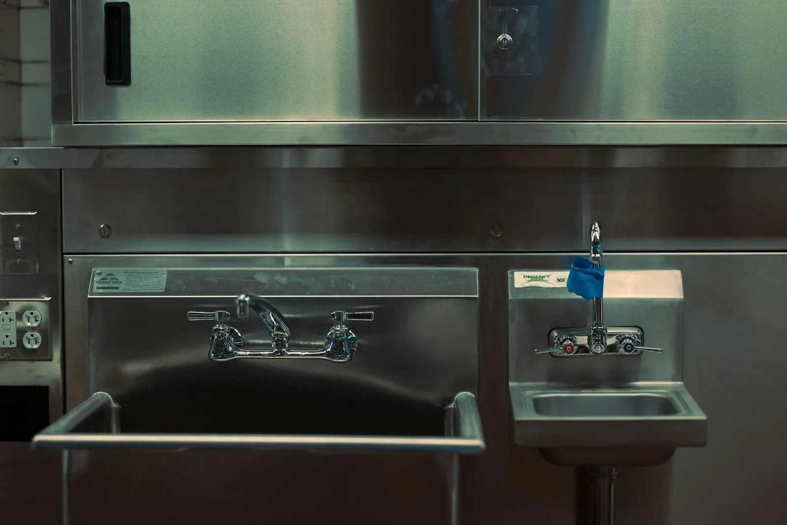 A surgical scrub sink, illustrating the standards a major operation requires.